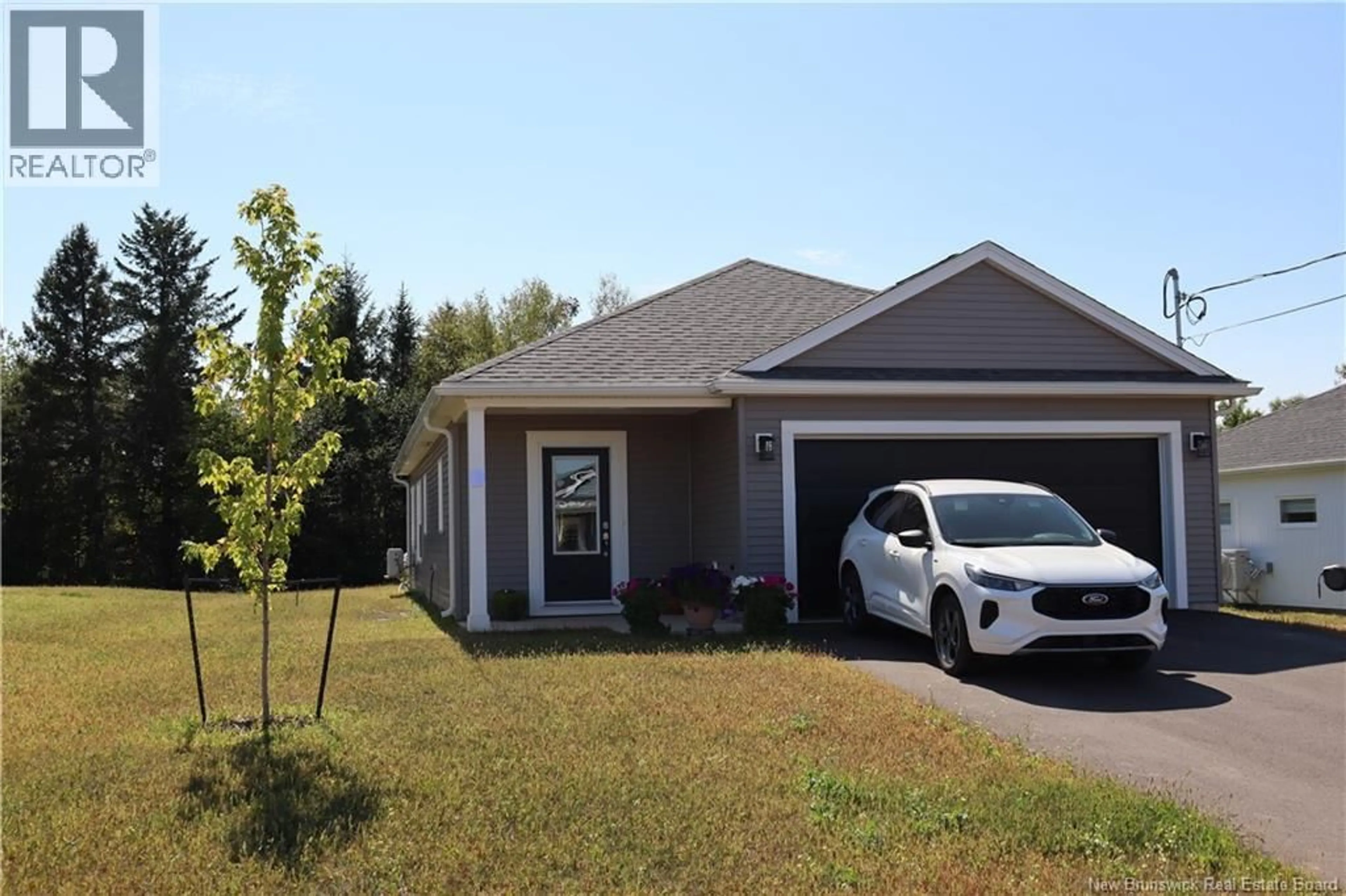 Home with vinyl exterior material, street for 40 BUCHANAN DRIVE, Sussex Corner New Brunswick E4E0B6