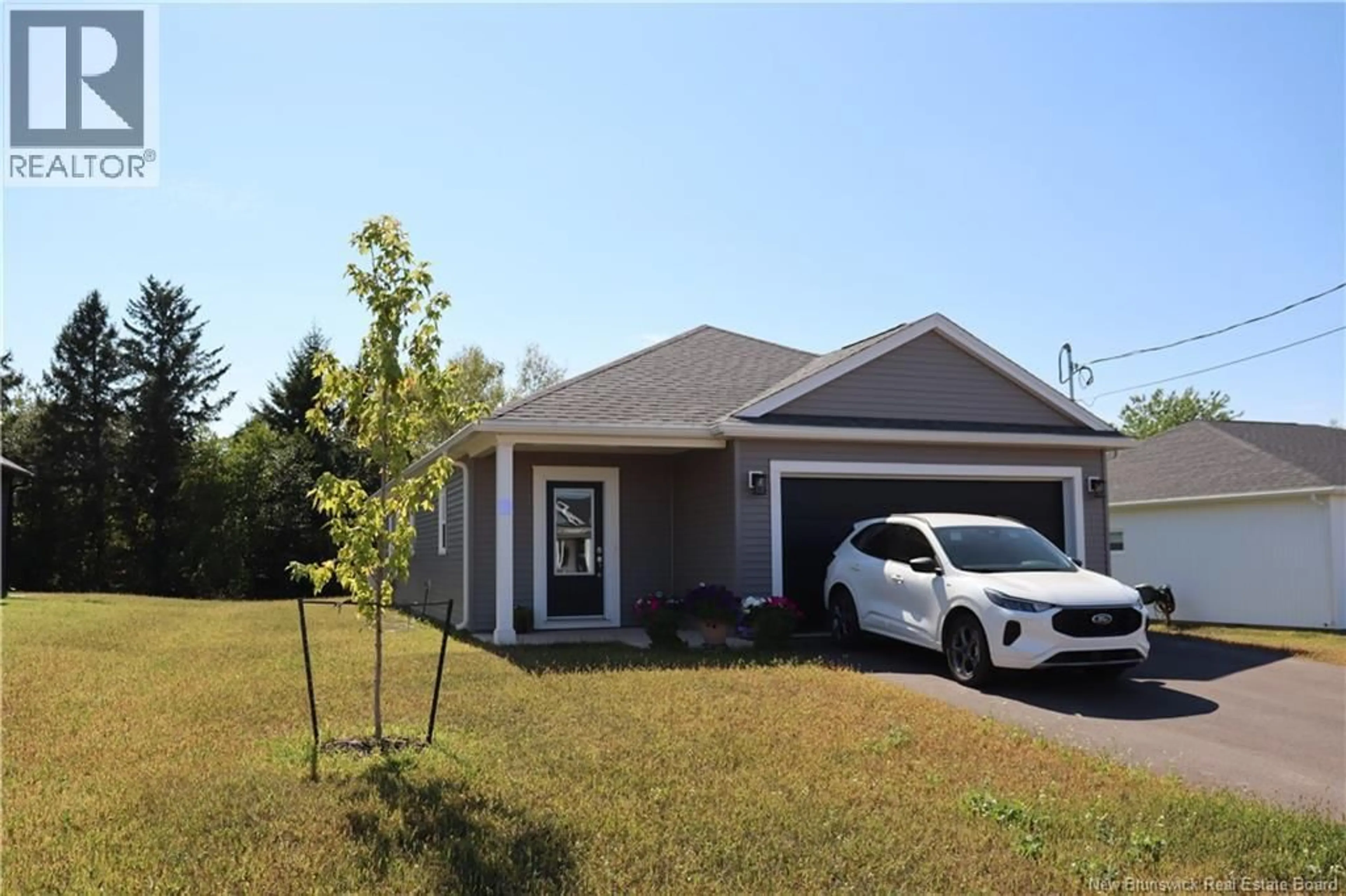 Home with vinyl exterior material, street for 40 BUCHANAN DRIVE, Sussex Corner New Brunswick E4E0B6