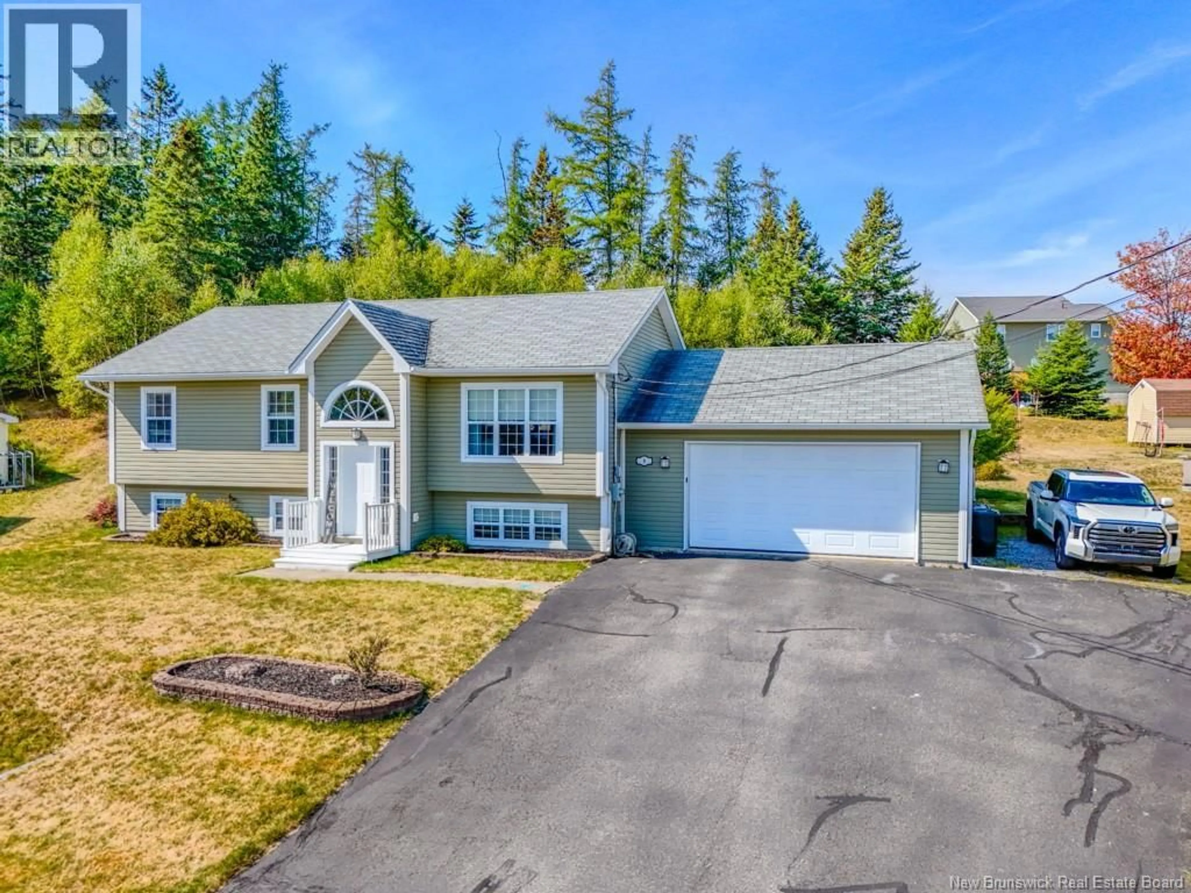 Home with vinyl exterior material, street for 8 AZALEA COURT, Quispamsis New Brunswick E2E0A6