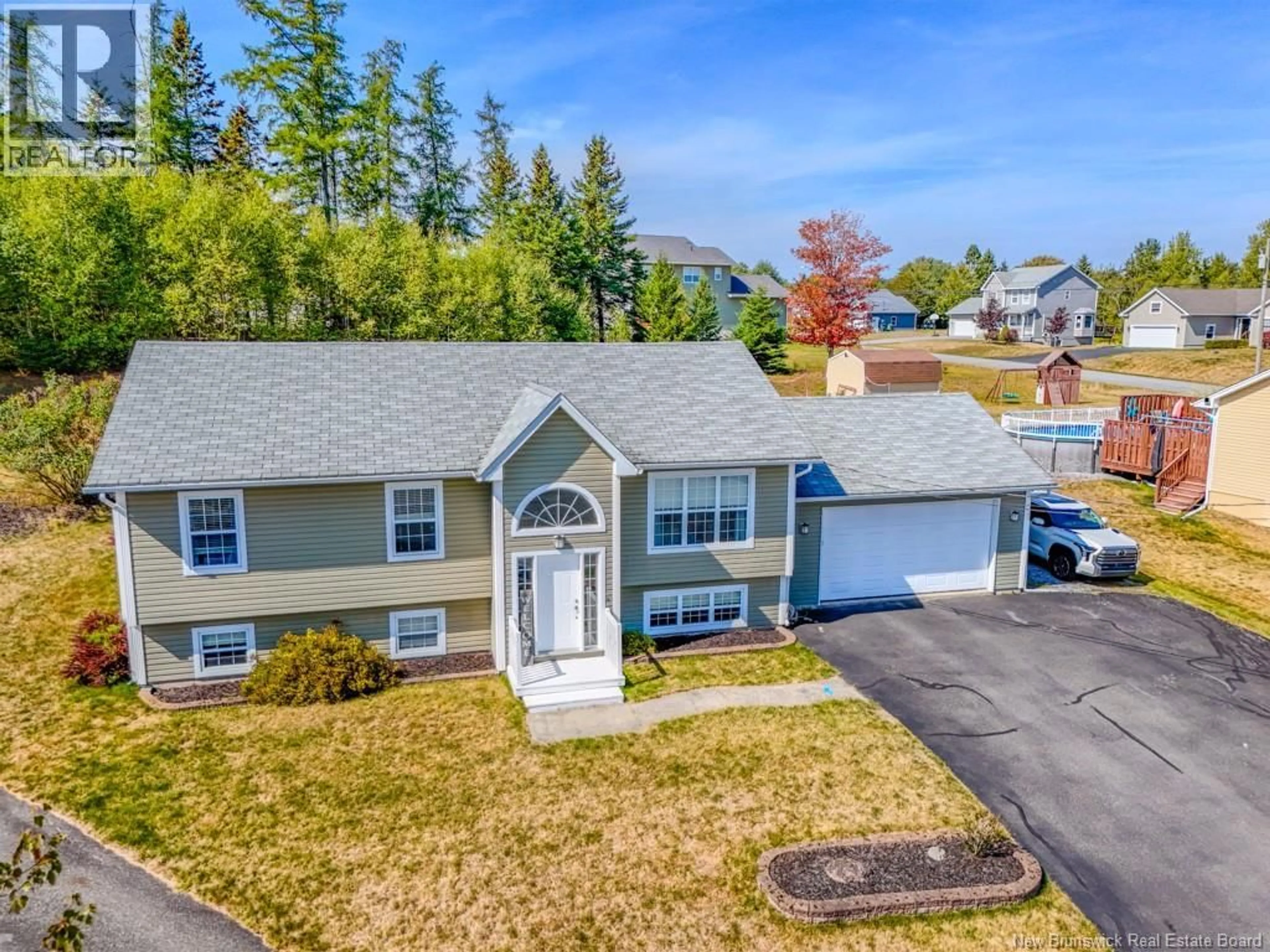 A pic from outside/outdoor area/front of a property/back of a property/a pic from drone, street for 8 AZALEA COURT, Quispamsis New Brunswick E2E0A6