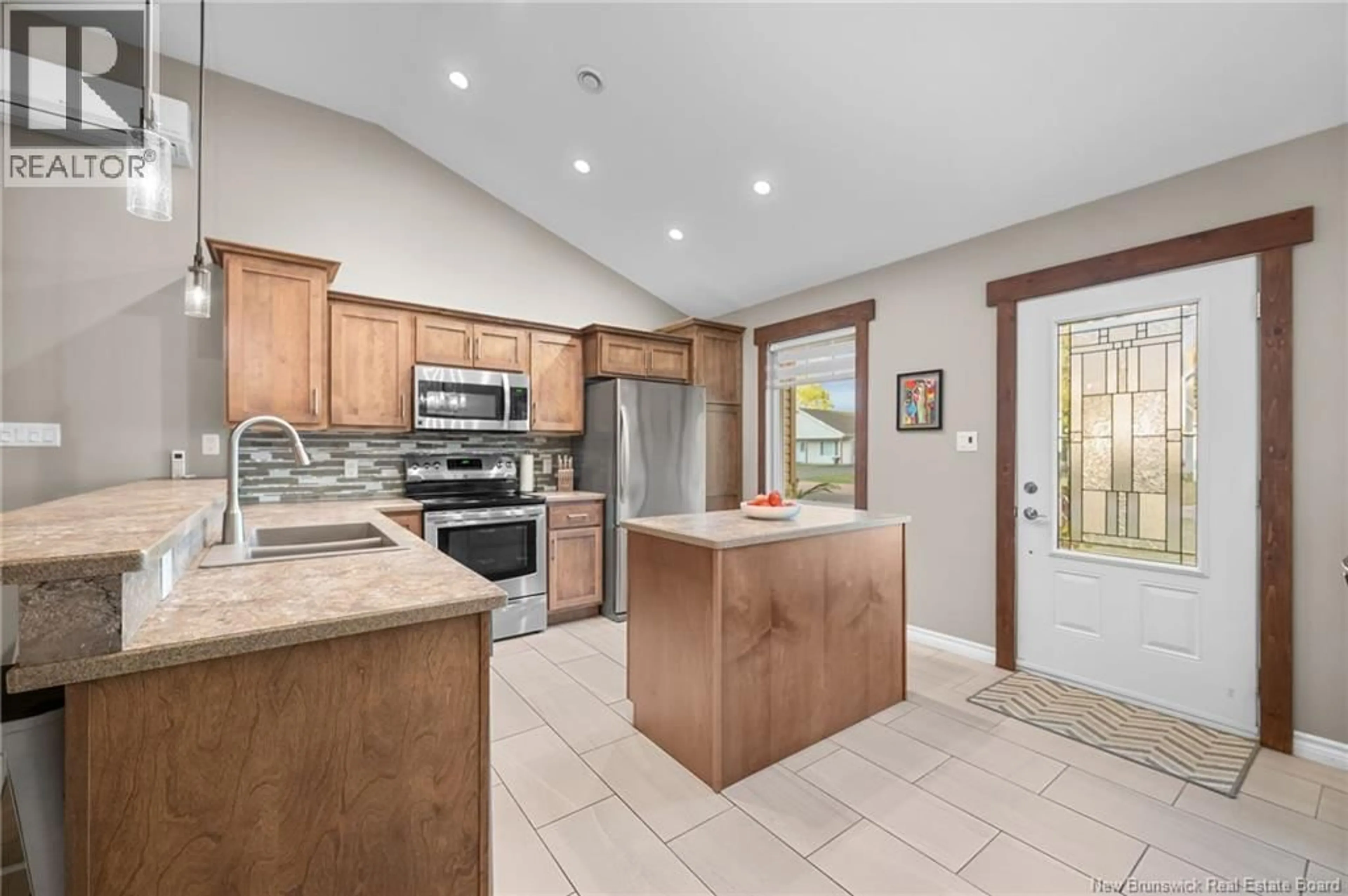 Open concept kitchen, ceramic/tile floor for 26 L'ARLUPPE STREET, Cap-Pelé New Brunswick E4N1W1