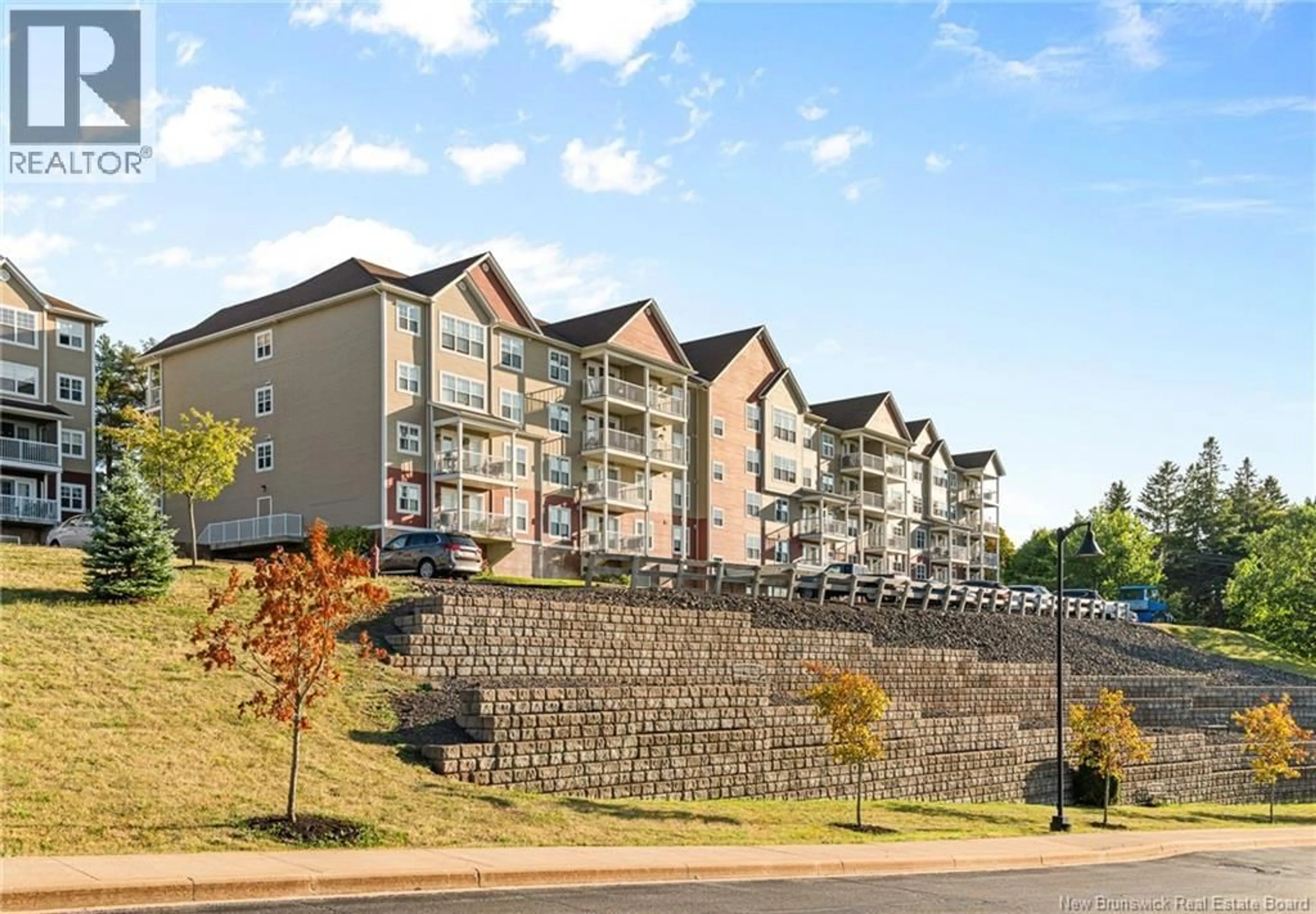 A pic from outside/outdoor area/front of a property/back of a property/a pic from drone, mountain view for 404 - 208 COVERDALE ROAD, Riverview New Brunswick E1B0M7