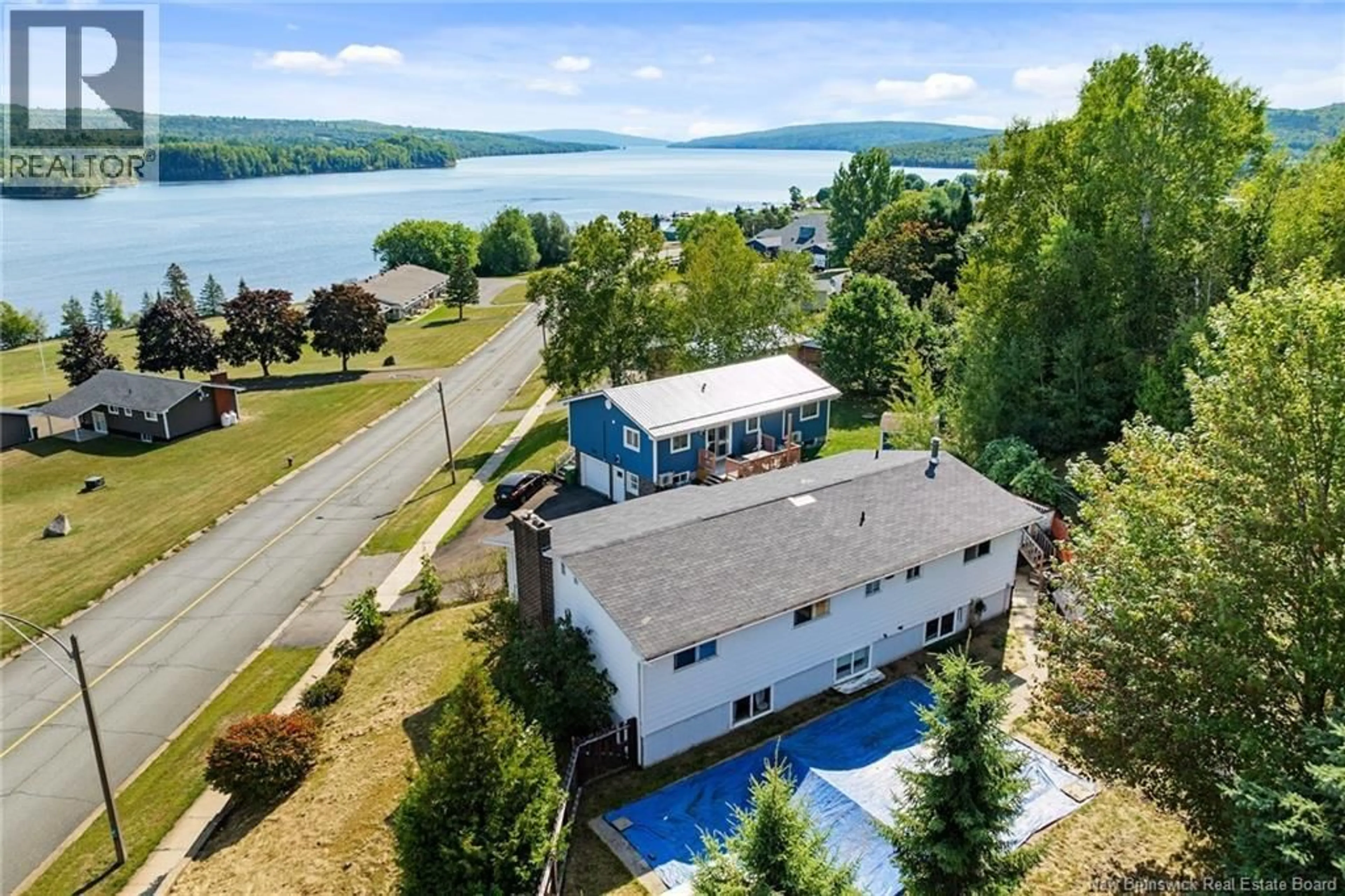 A pic from outside/outdoor area/front of a property/back of a property/a pic from drone, water/lake/river/ocean view for 81 OTIS DRIVE, Nackawic New Brunswick E6G1G8