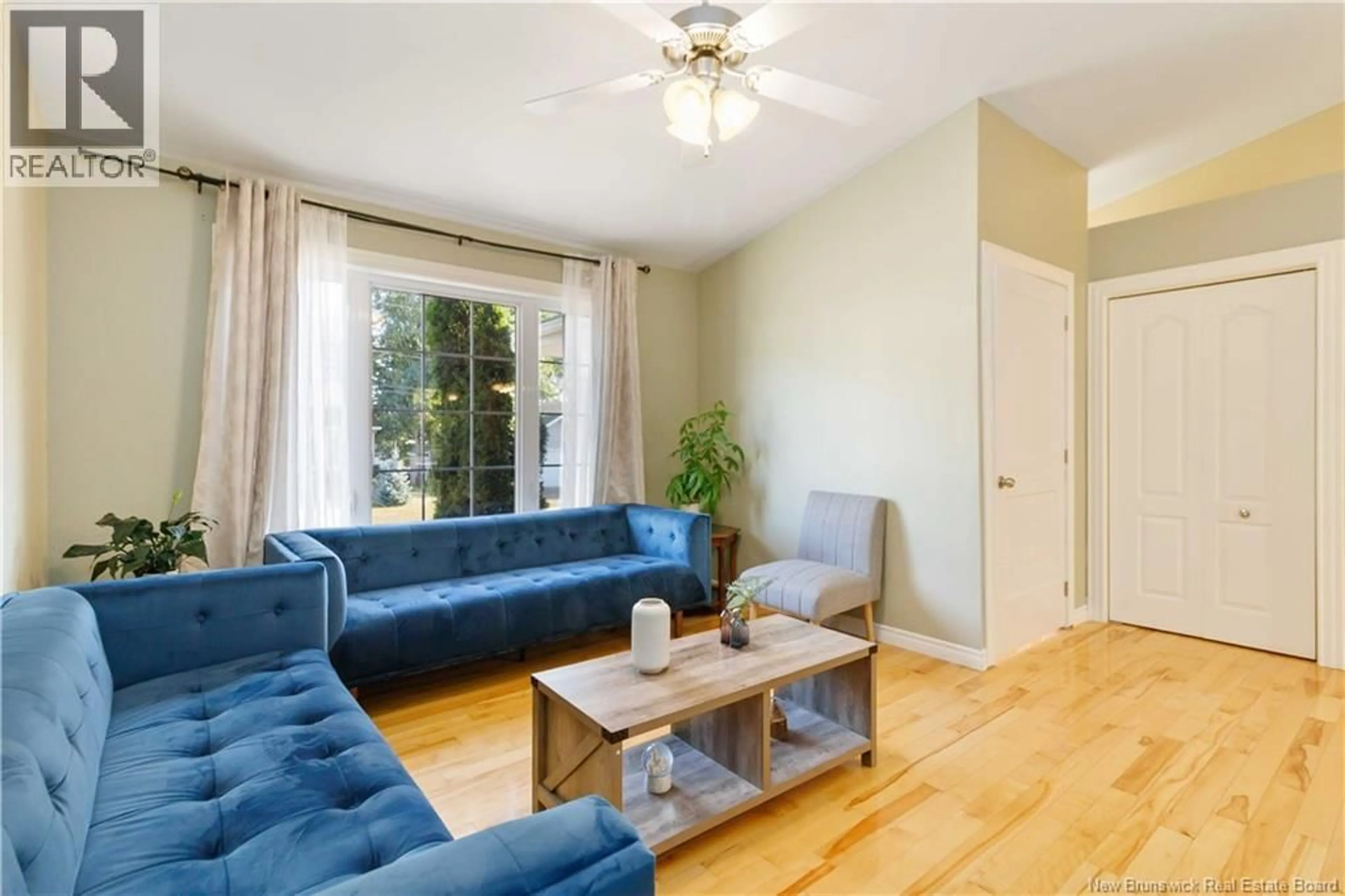 Living room with furniture, wood/laminate floor for 101 HERMAN STREET, Dieppe New Brunswick E1A0L4