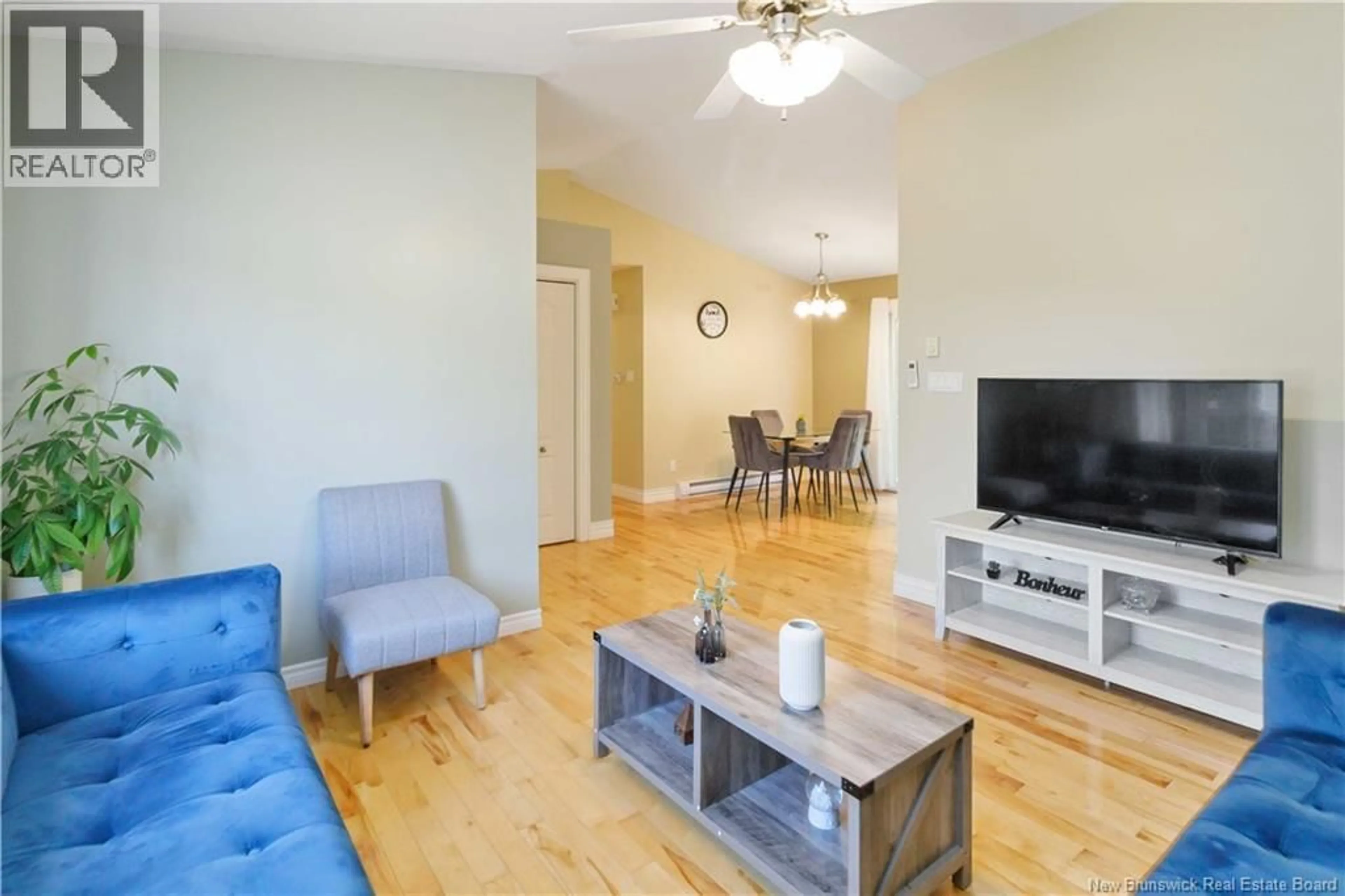 Living room with furniture, wood/laminate floor for 101 HERMAN STREET, Dieppe New Brunswick E1A0L4
