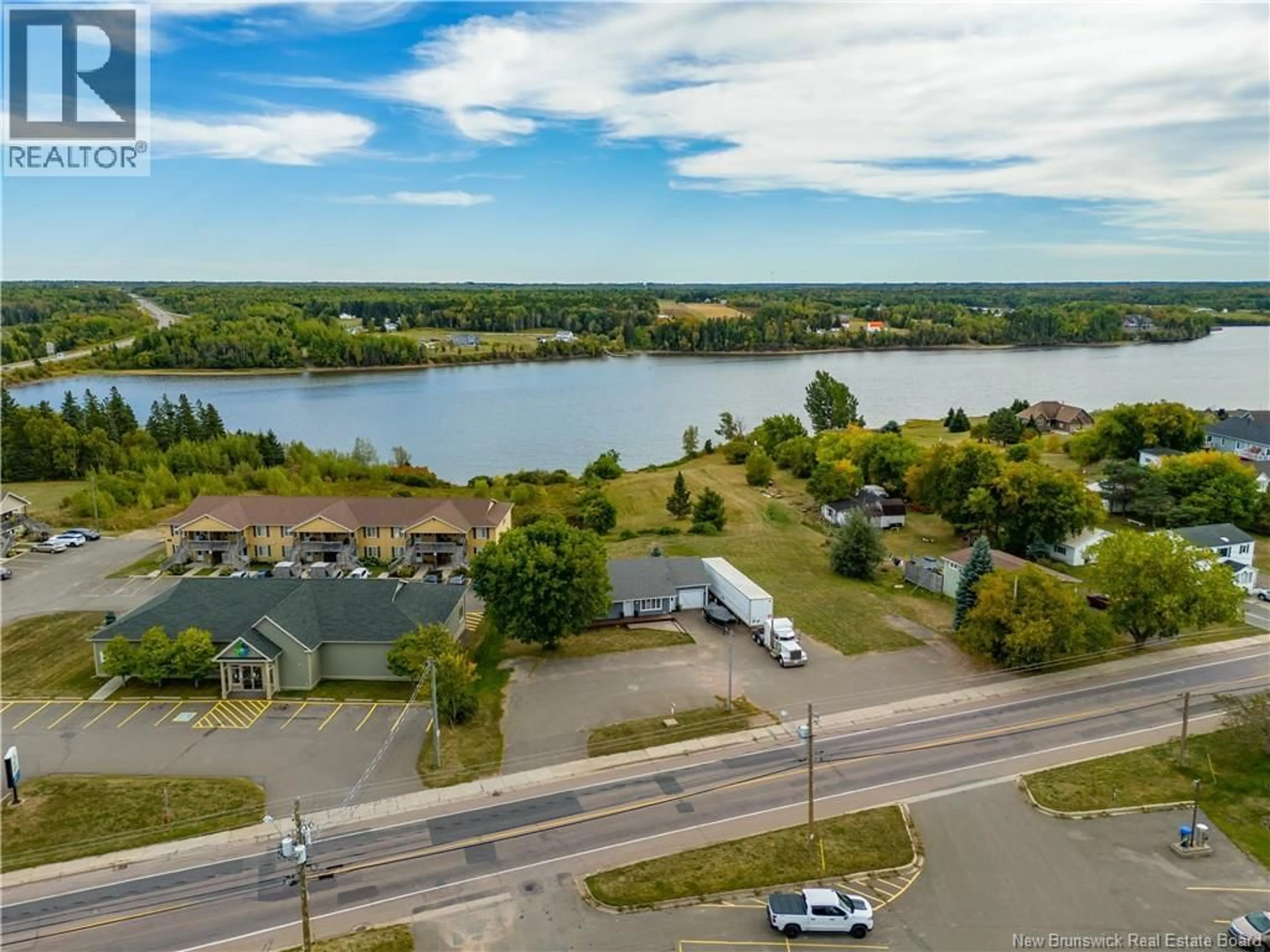 A pic from outside/outdoor area/front of a property/back of a property/a pic from drone, water/lake/river/ocean view for 200 IRVING BOULEVARD, Bouctouche New Brunswick E4S3L7