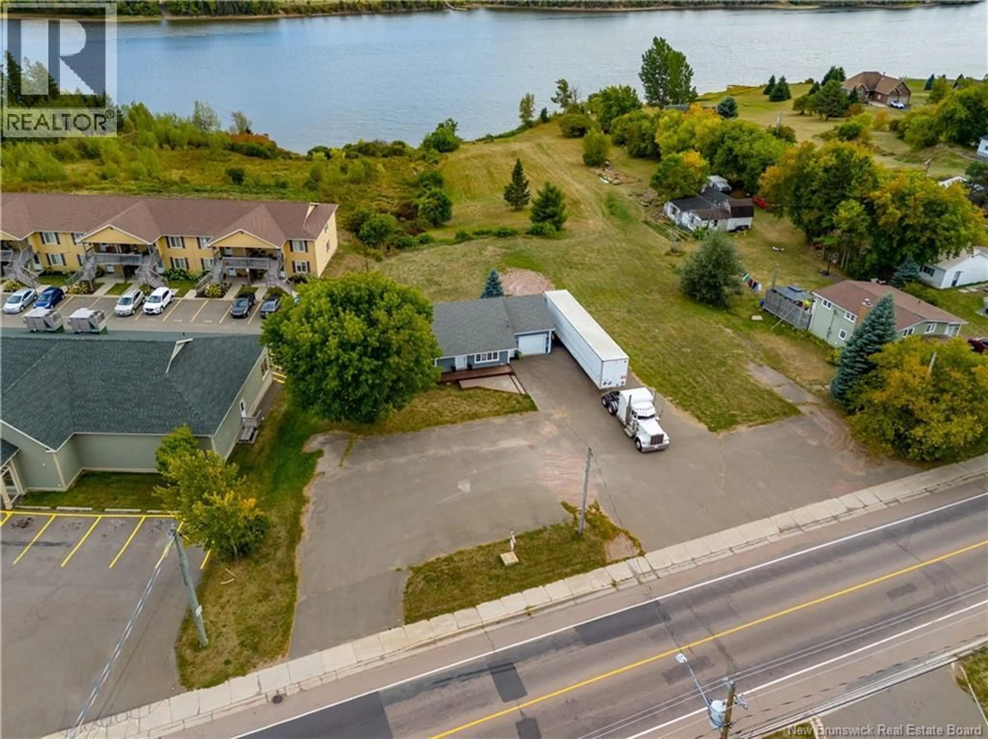 A pic from outside/outdoor area/front of a property/back of a property/a pic from drone, water/lake/river/ocean view for 200 IRVING BOULEVARD, Bouctouche New Brunswick E4S3L7