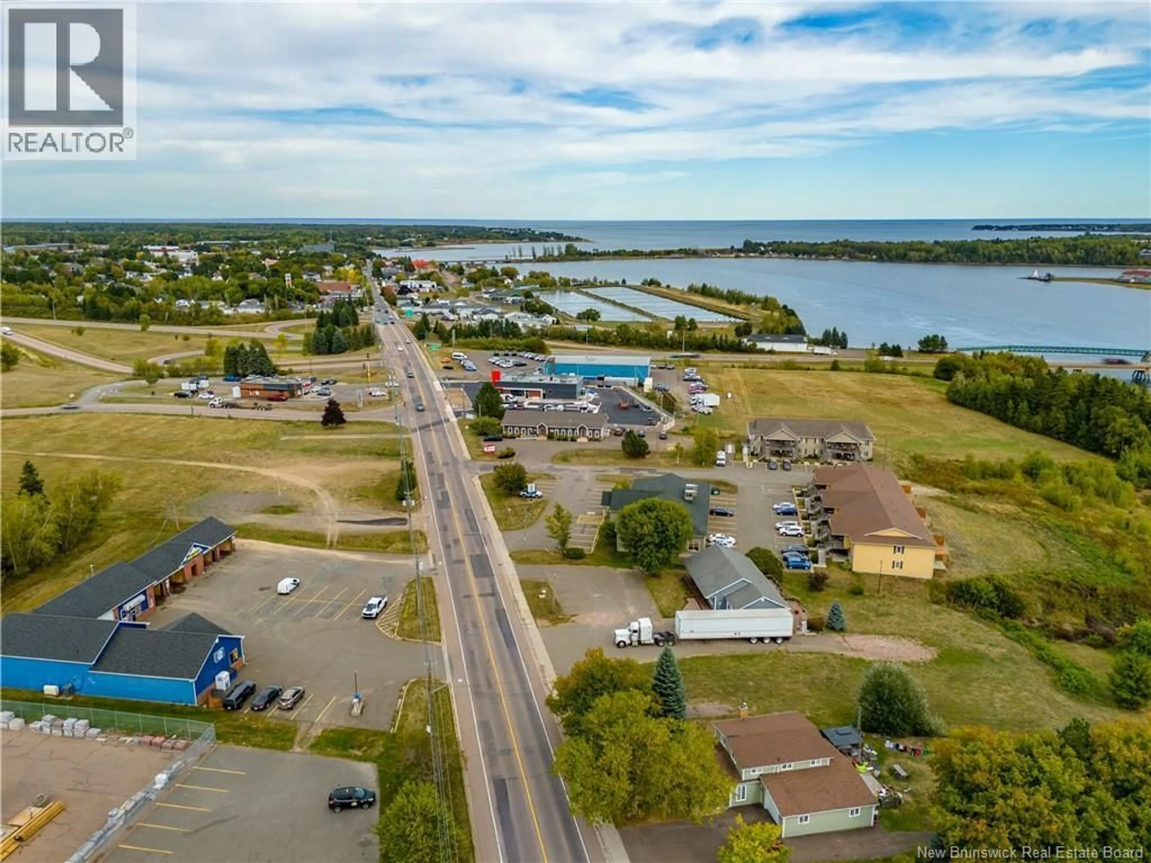 A pic from outside/outdoor area/front of a property/back of a property/a pic from drone, water/lake/river/ocean view for 200 IRVING BOULEVARD, Bouctouche New Brunswick E4S3L7