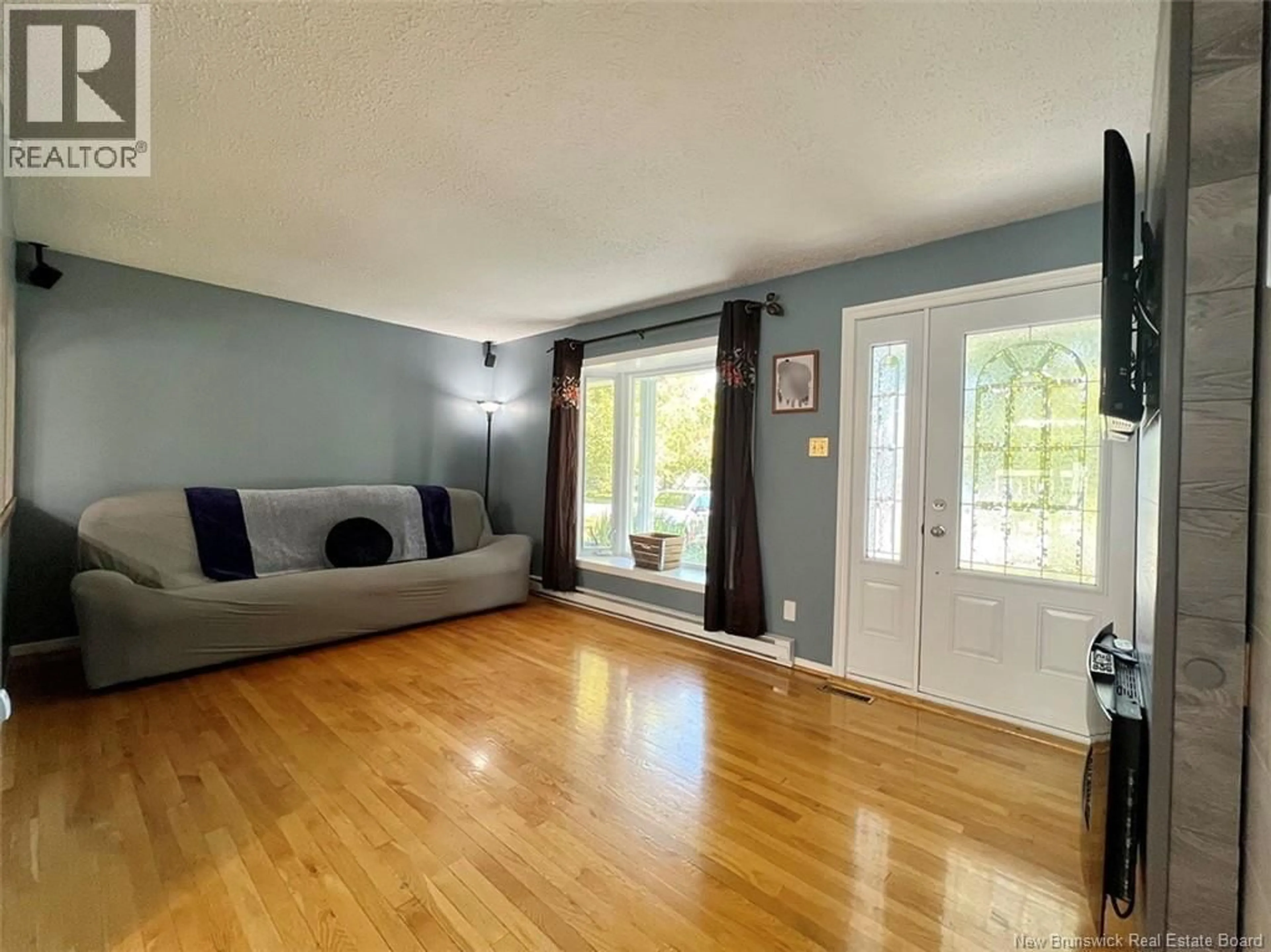 Living room with furniture, unknown for 8 LÉONARD STREET, Saint-Jacques New Brunswick E7B1K7