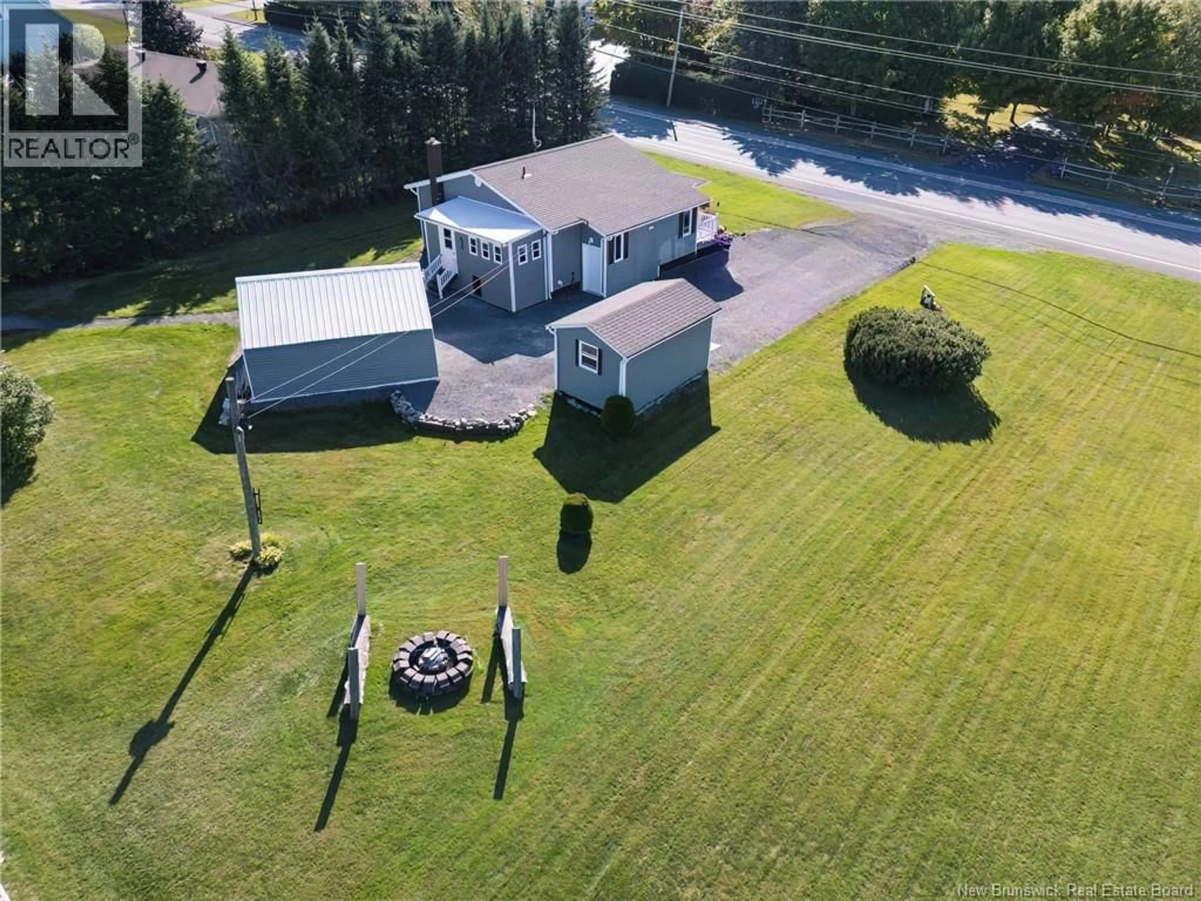 A pic from outside/outdoor area/front of a property/back of a property/a pic from drone, unknown for 409 ROUTE 255, Saint-André New Brunswick E3Y2V5