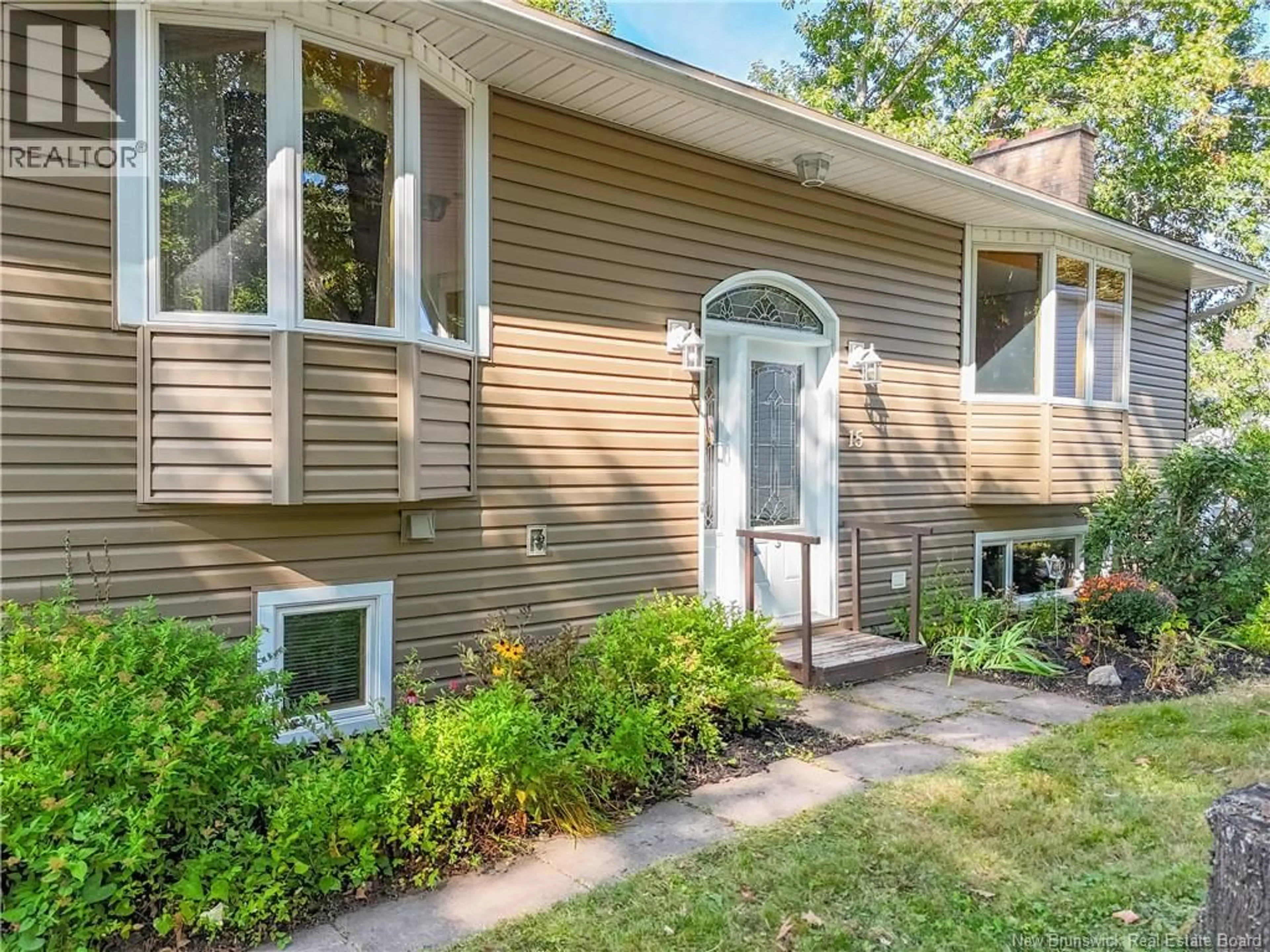 Home with vinyl exterior material, street for 15 CORONATION COURT, Fredericton New Brunswick E3A4K3