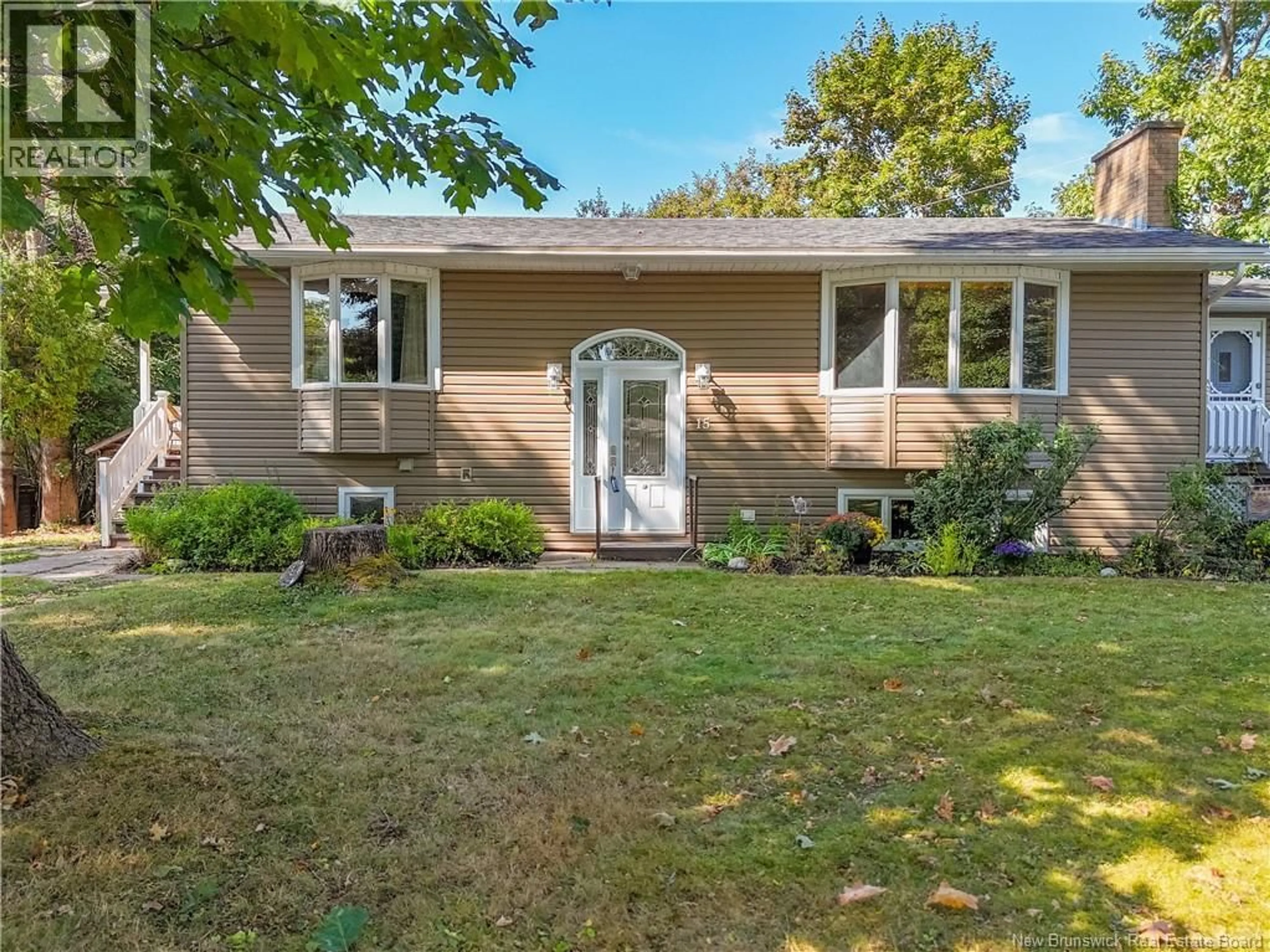 Home with vinyl exterior material, street for 15 CORONATION COURT, Fredericton New Brunswick E3A4K3