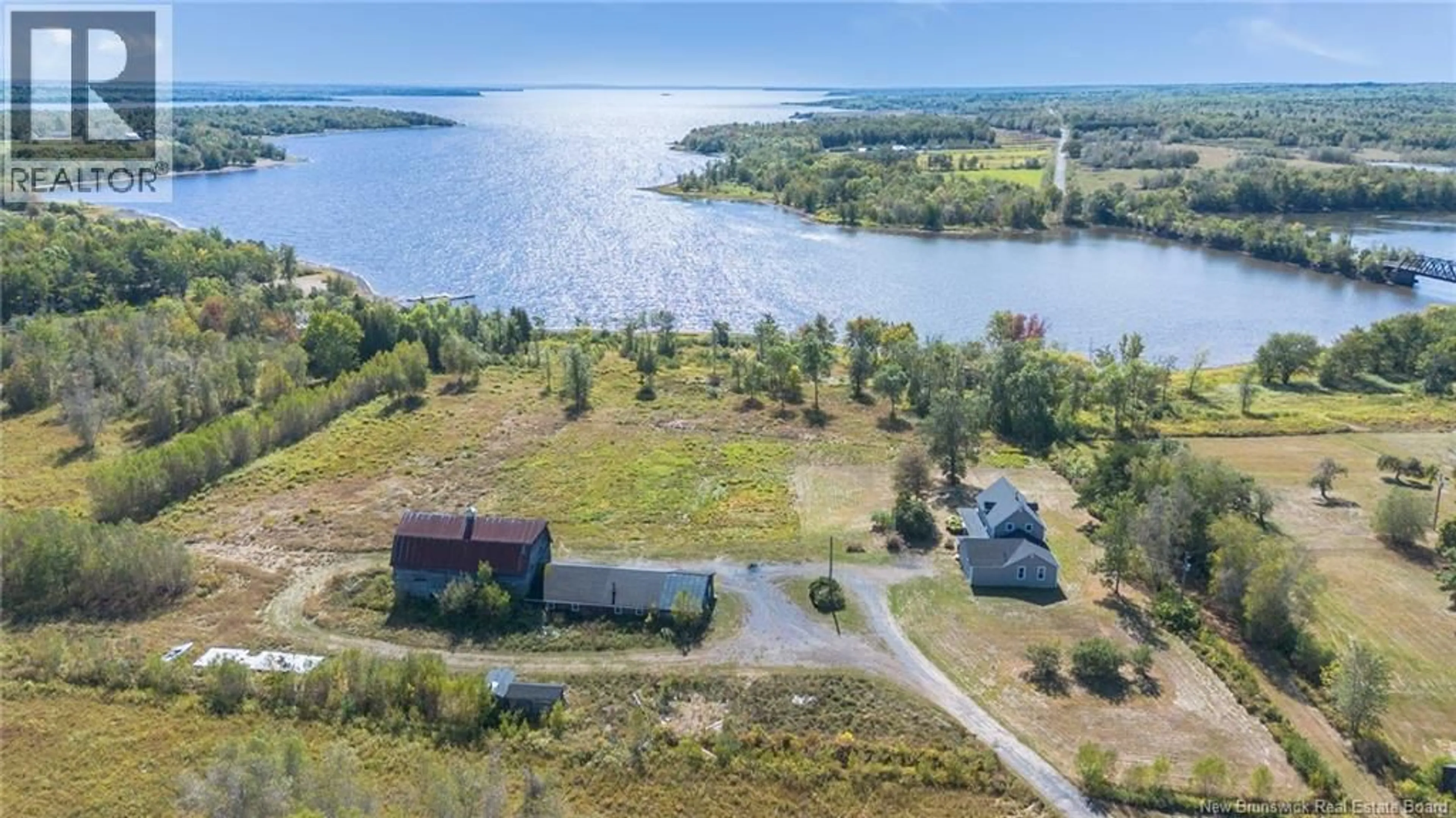 A pic from outside/outdoor area/front of a property/back of a property/a pic from drone, water/lake/river/ocean view for 28 CHAPMAN ROAD, Newcastle Centre New Brunswick E4B2L6
