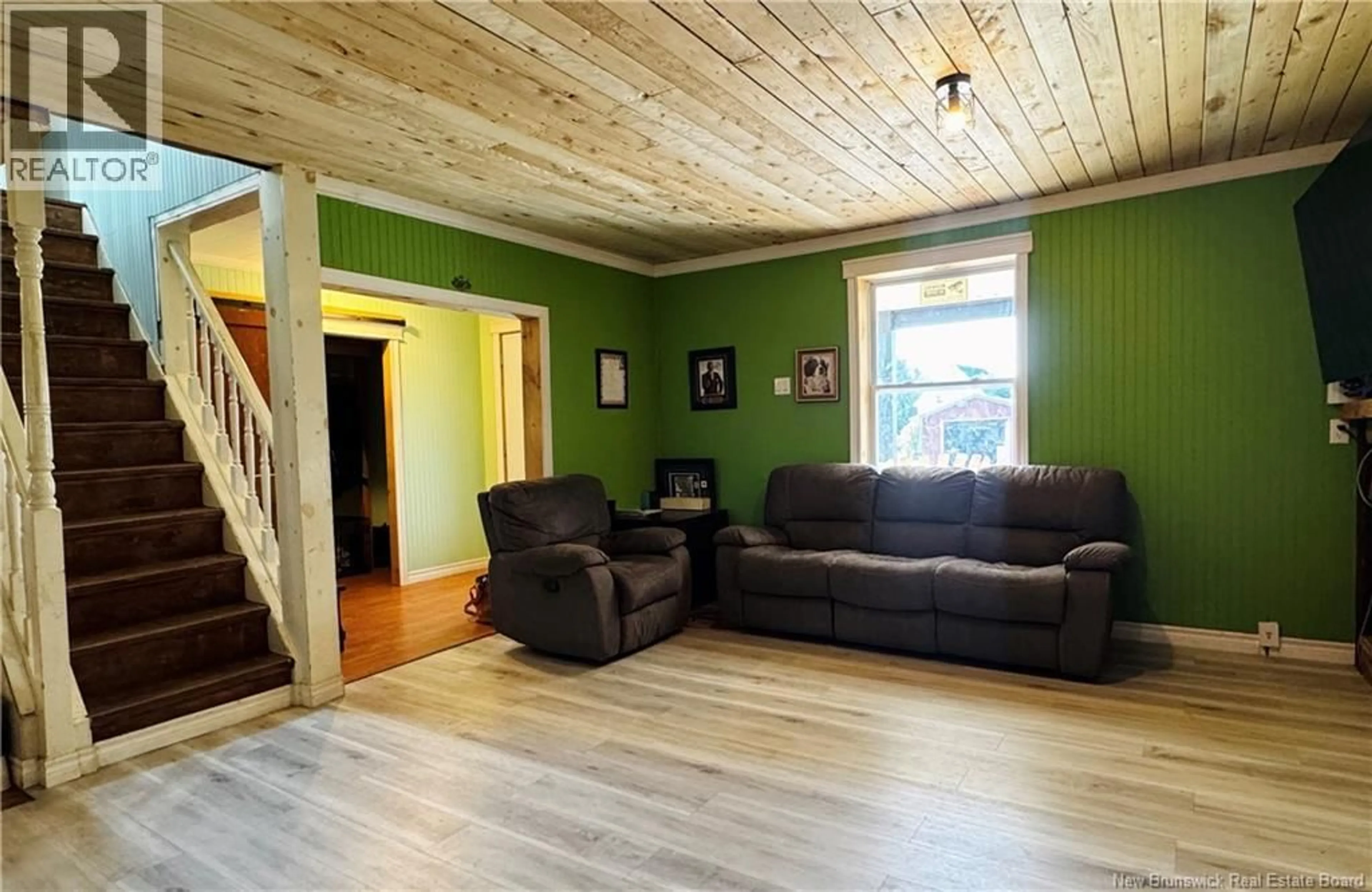 Living room with furniture, wood/laminate floor for 5657 ROUTE 340, Haut-Paquetville New Brunswick E8R1T1
