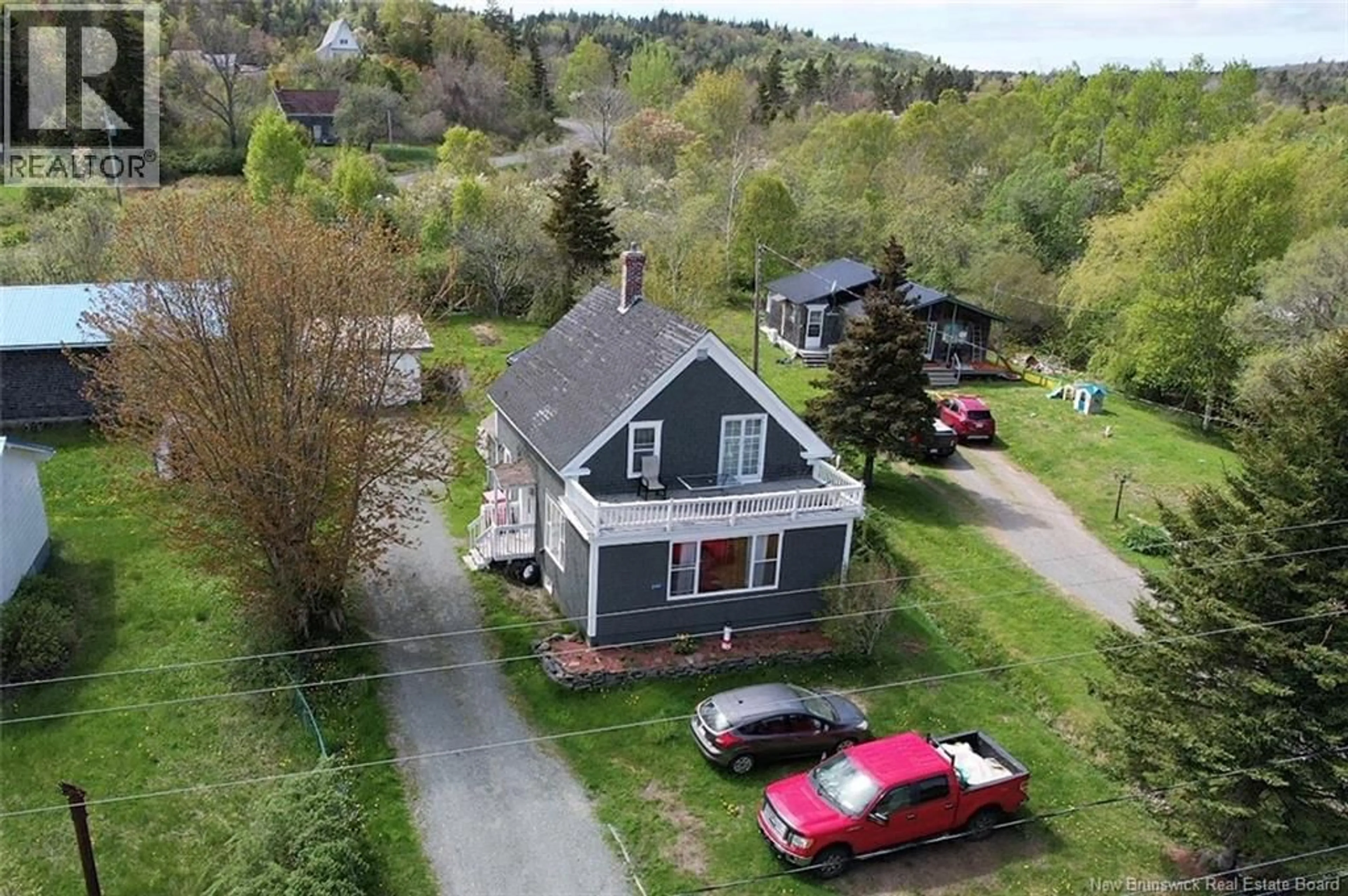 A pic from outside/outdoor area/front of a property/back of a property/a pic from drone, street for 240 776 ROUTE, Grand Manan New Brunswick E5G1A5