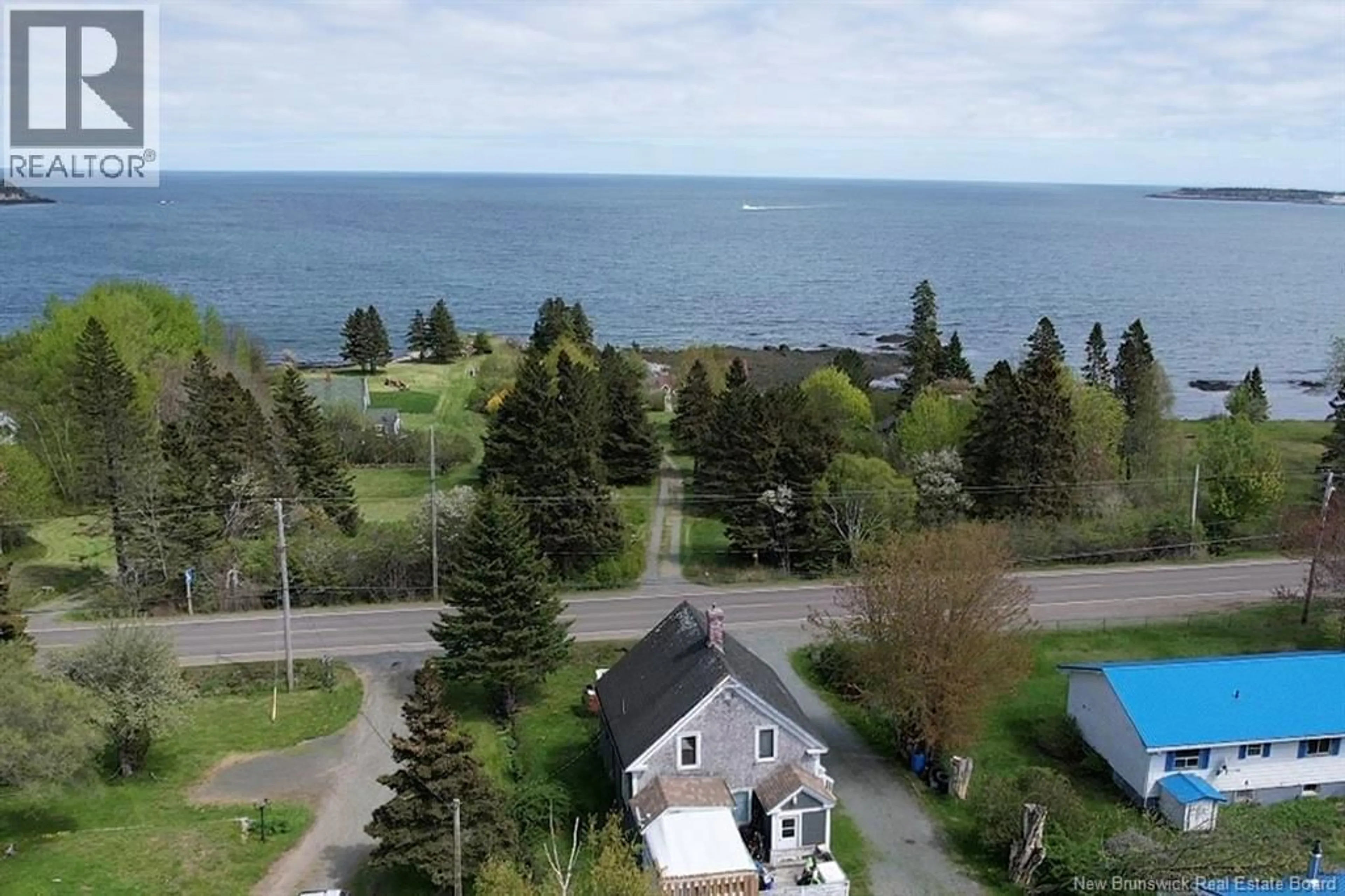 A pic from outside/outdoor area/front of a property/back of a property/a pic from drone, water/lake/river/ocean view for 240 776 ROUTE, Grand Manan New Brunswick E5G1A5