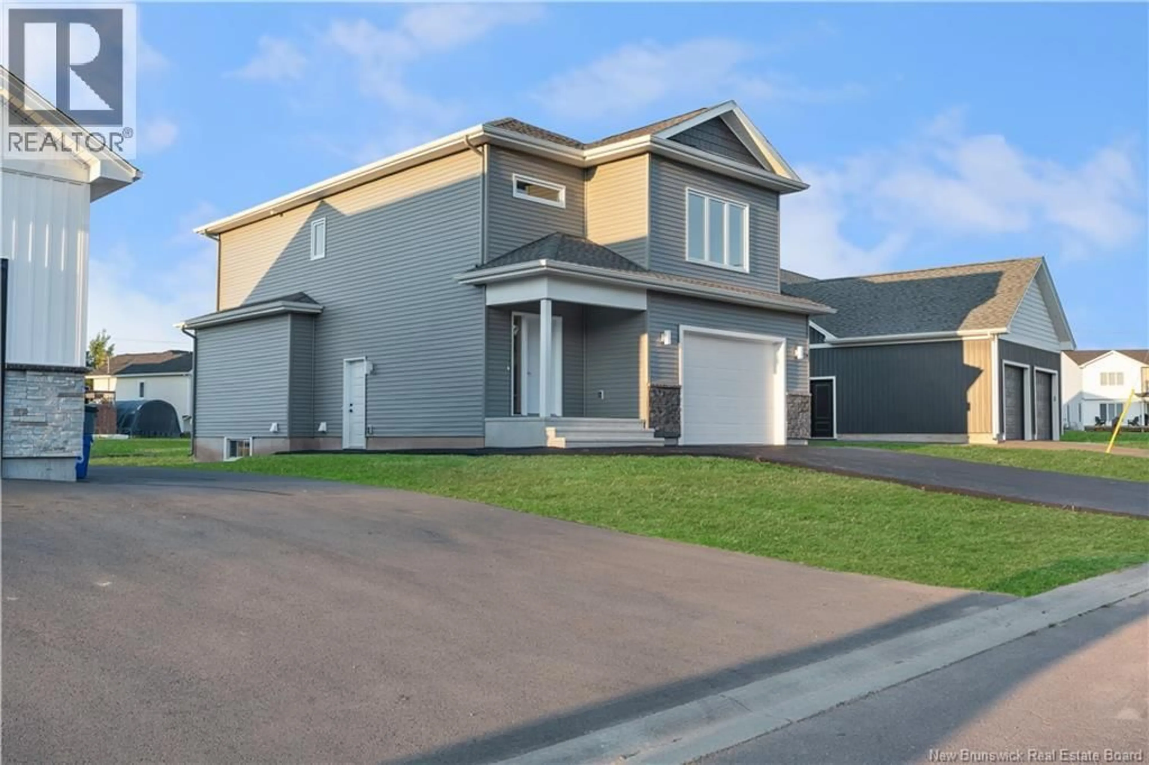 Home with vinyl exterior material, street for 64 GUY STREET, Shediac New Brunswick E4P0L5