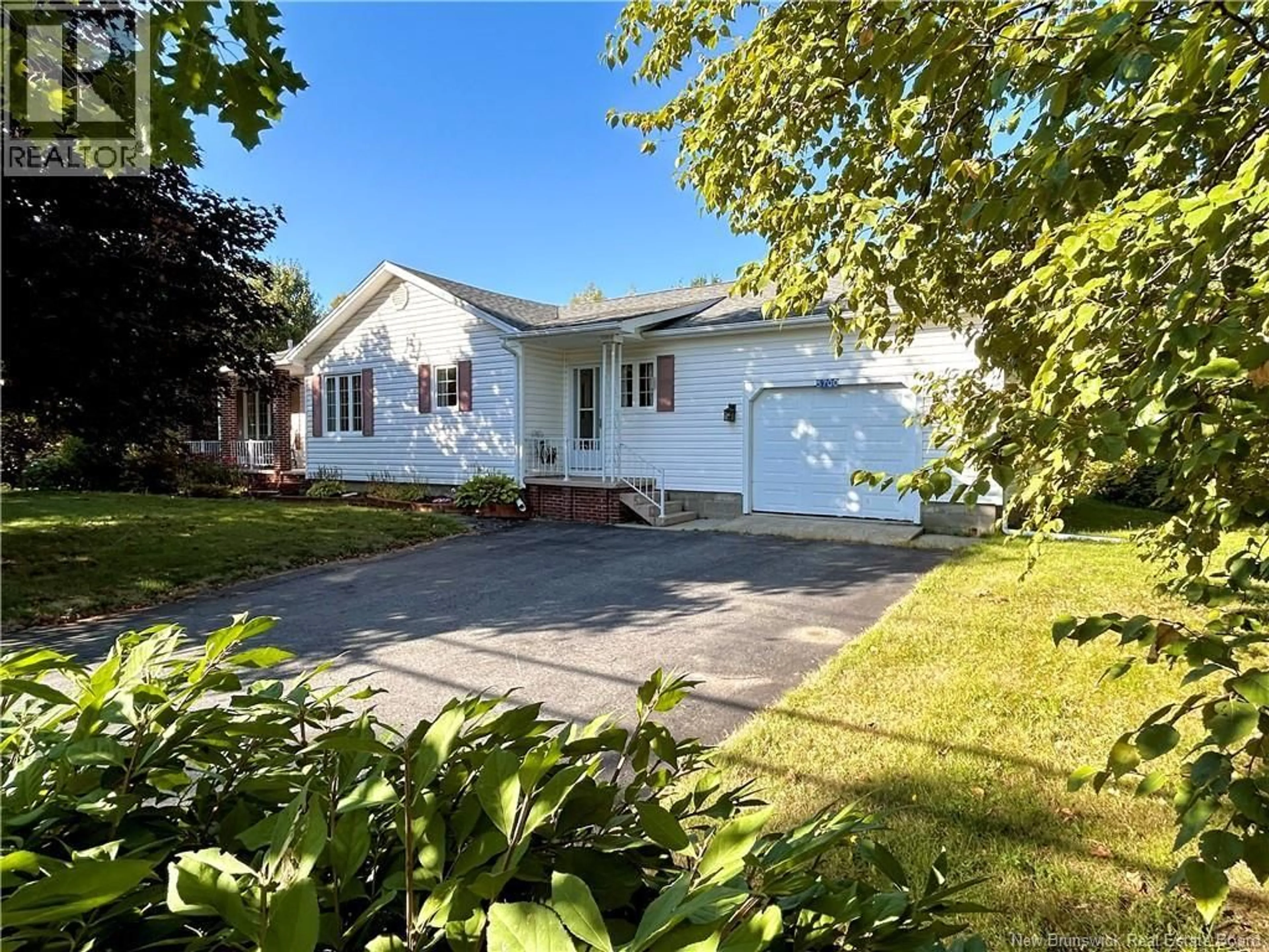 Home with vinyl exterior material, street for 5700 ROUTE 117, Baie-Sainte-Anne New Brunswick E9A1H8