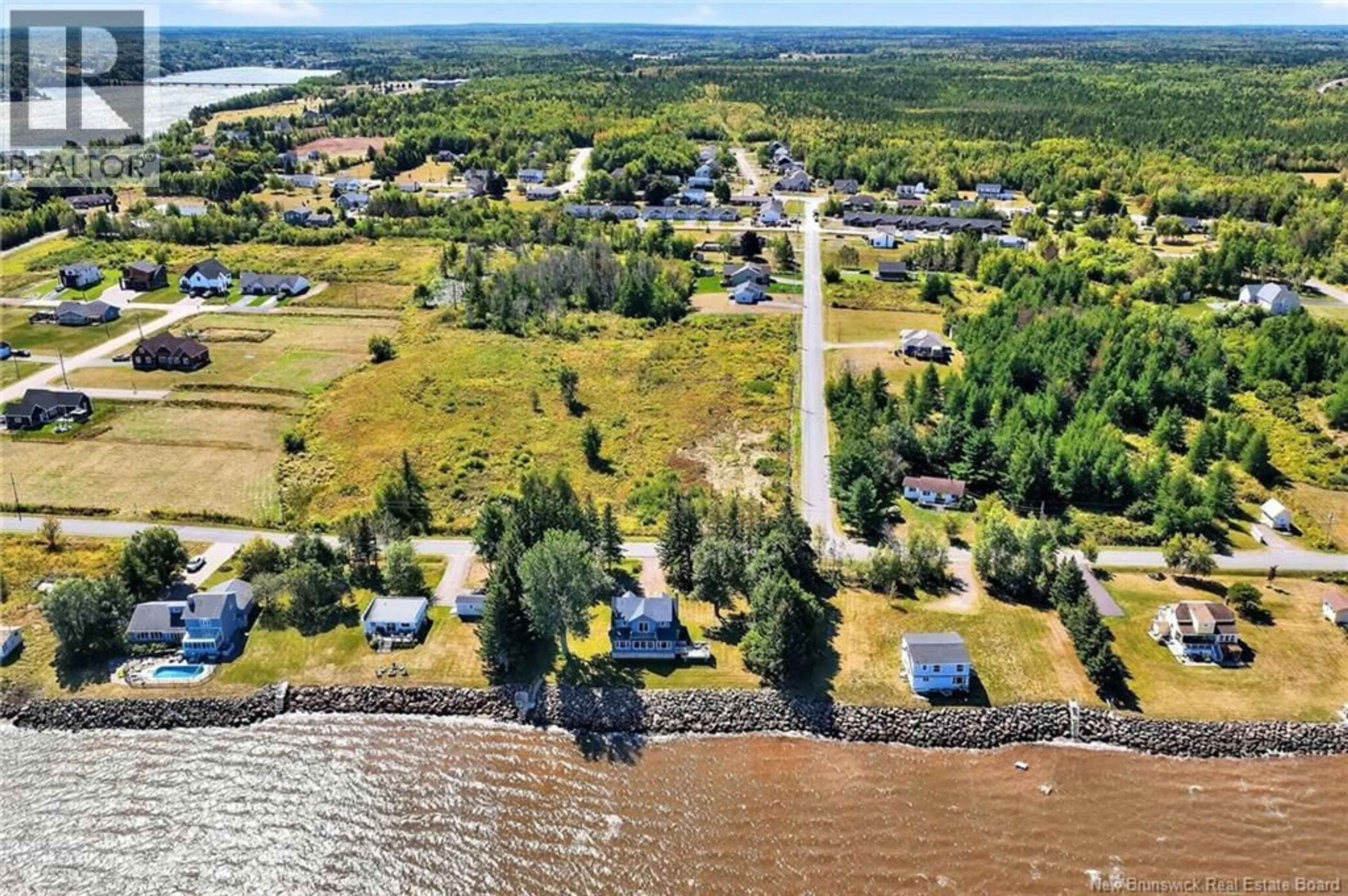 A pic from outside/outdoor area/front of a property/back of a property/a pic from drone, water/lake/river/ocean view for 101 LOUIS BOURG, Bouctouche New Brunswick E4S3N6