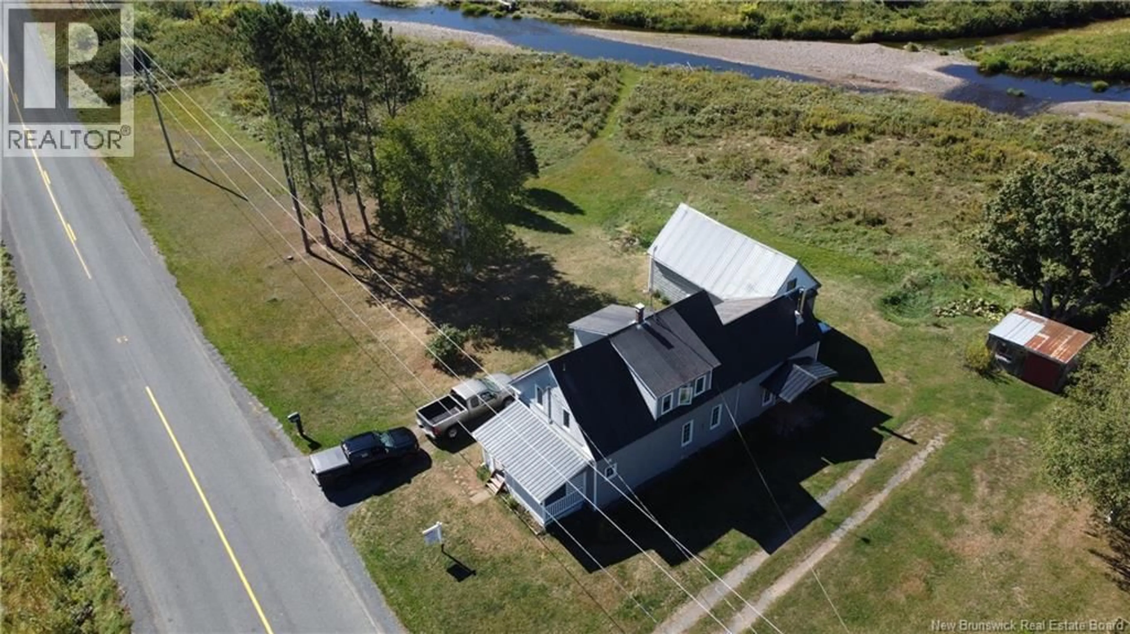 A pic from outside/outdoor area/front of a property/back of a property/a pic from drone, unknown for 6369 104 ROUTE, Cloverdale New Brunswick E7P1X5