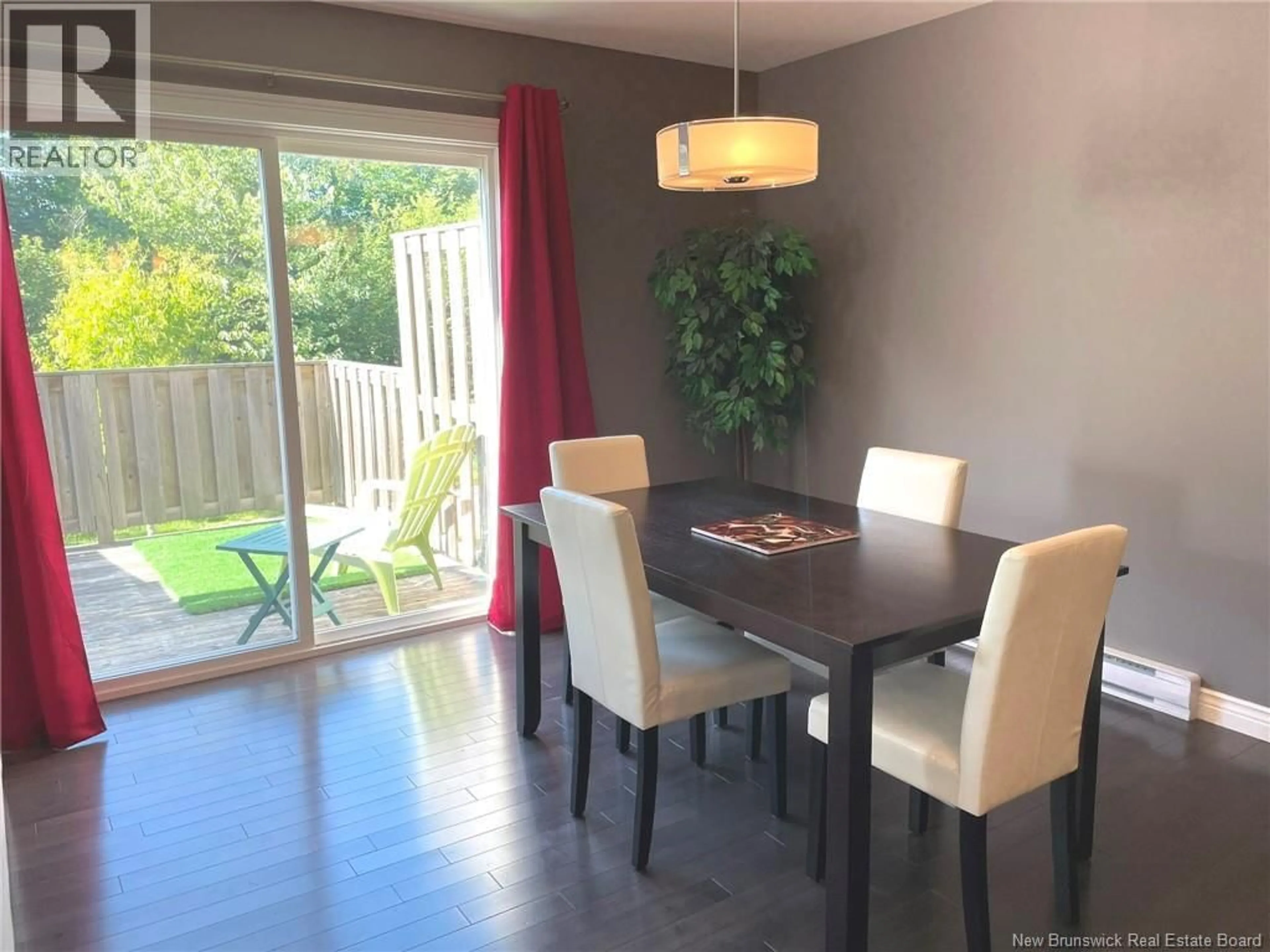Dining room, wood/laminate floor for 371 DOLBEAU STREET, Dieppe New Brunswick E1A9P9