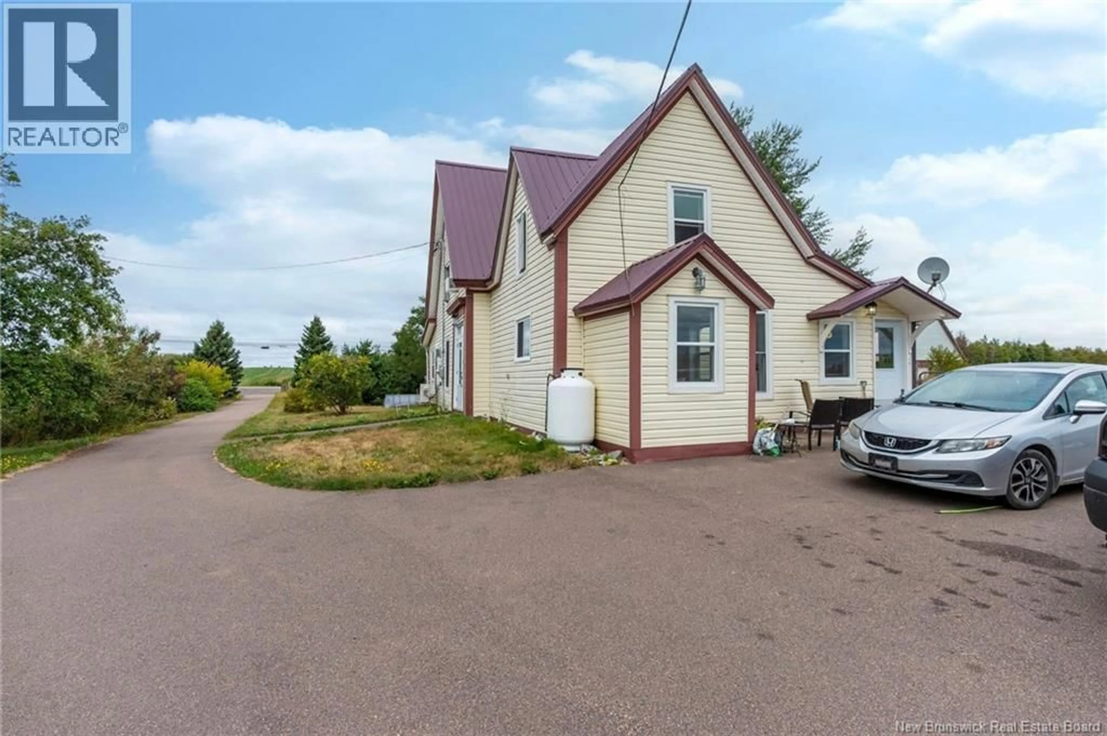 A pic from outside/outdoor area/front of a property/back of a property/a pic from drone, street for 4235 ROUTE 16, Malden New Brunswick E4M2H2