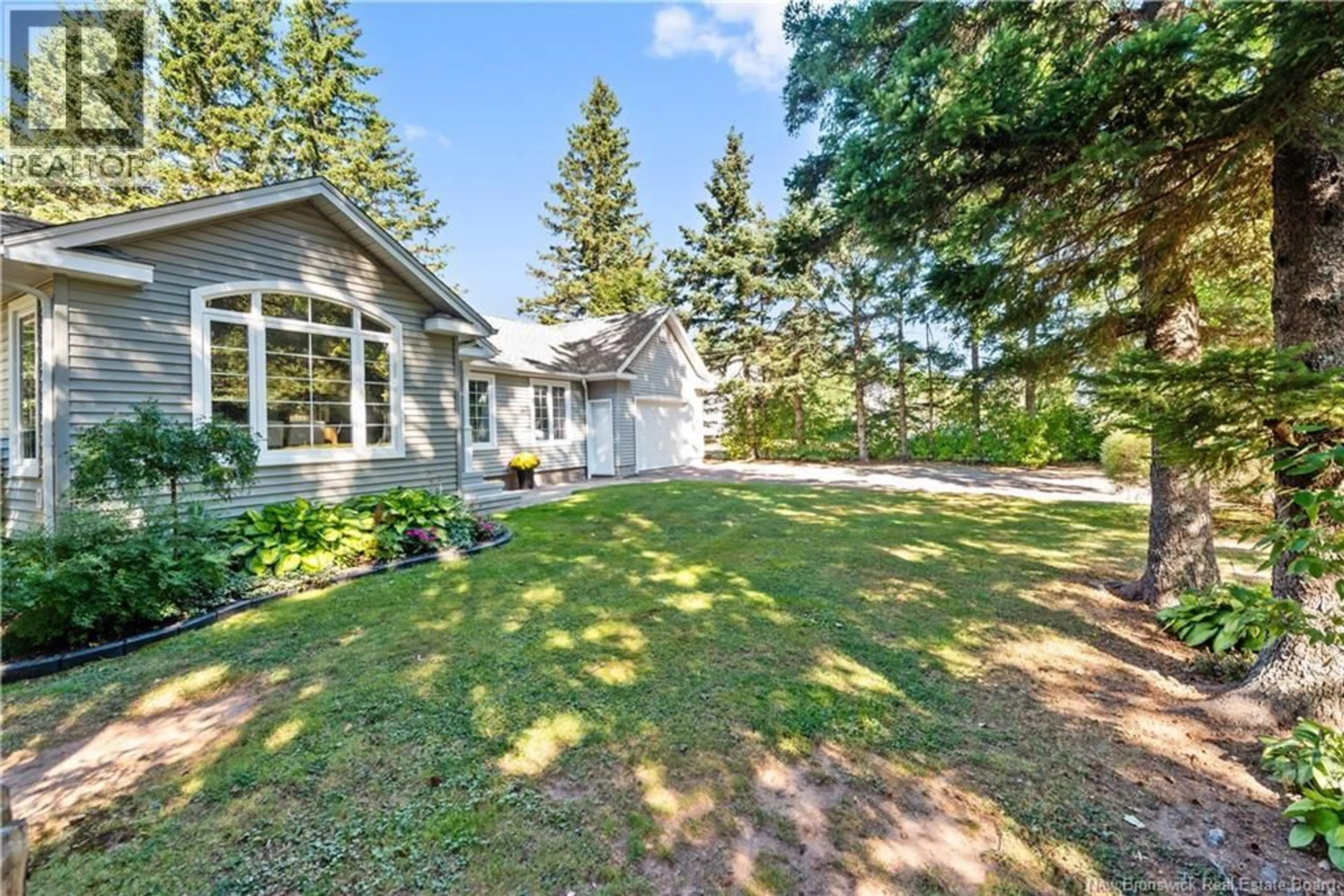 A pic from outside/outdoor area/front of a property/back of a property/a pic from drone, water/lake/river/ocean view for 77 133 ROUTE ROUTE, Shediac New Brunswick E4P3C8