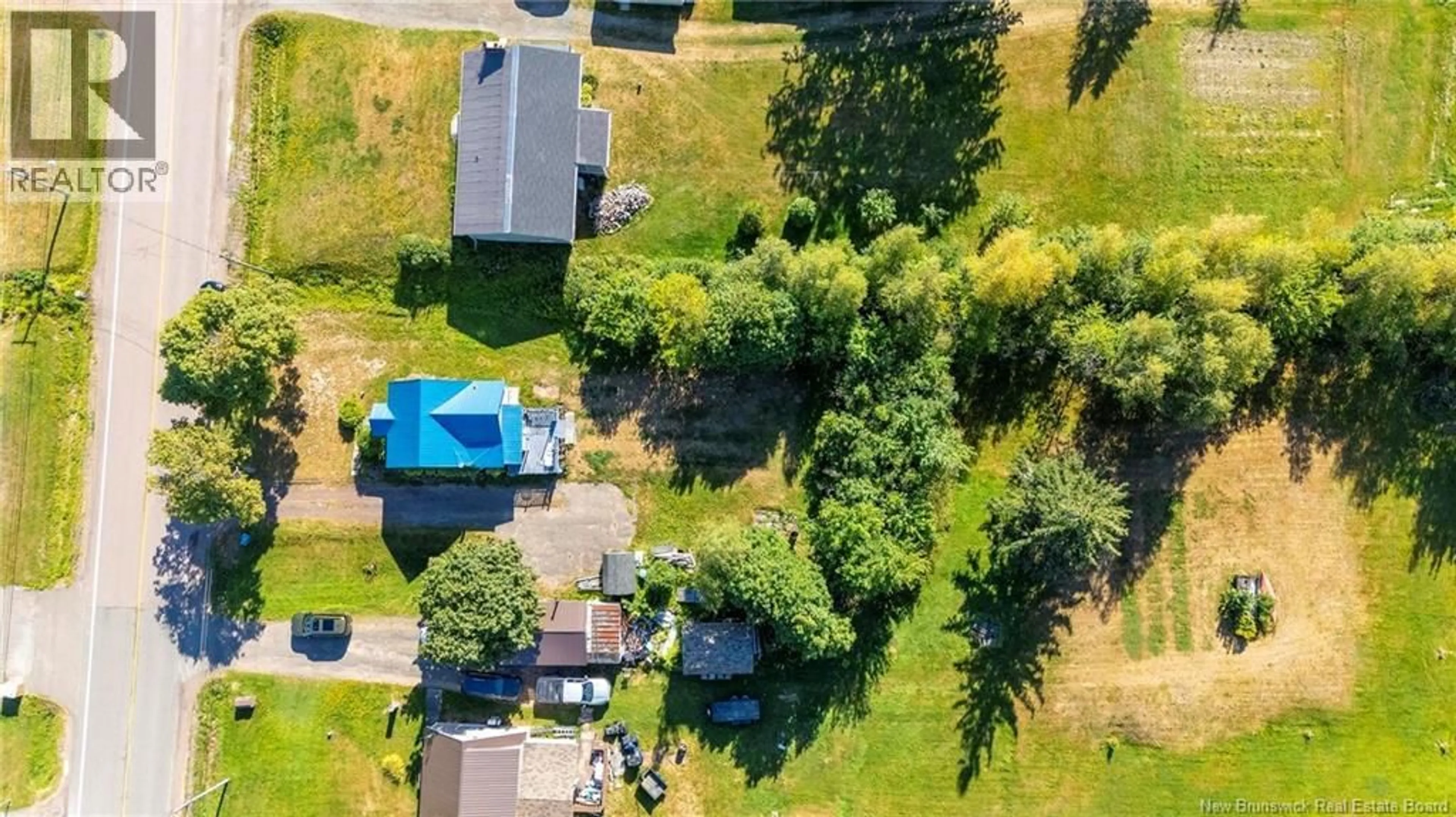A pic from outside/outdoor area/front of a property/back of a property/a pic from drone, street for 1179 ROUTE 133, Grand-Barachois New Brunswick E4P8C5