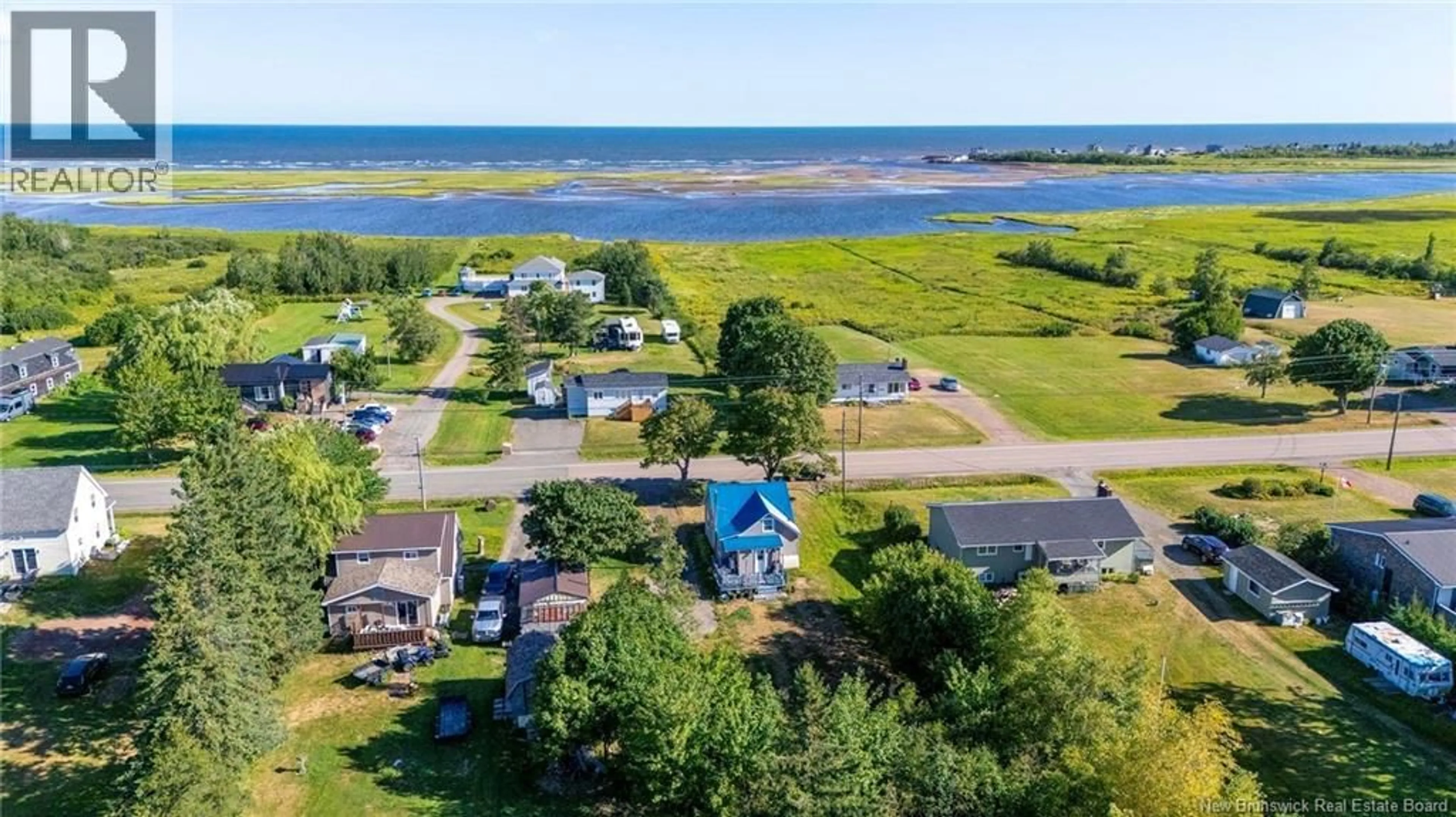 A pic from outside/outdoor area/front of a property/back of a property/a pic from drone, water/lake/river/ocean view for 1179 ROUTE 133, Grand-Barachois New Brunswick E4P8C5
