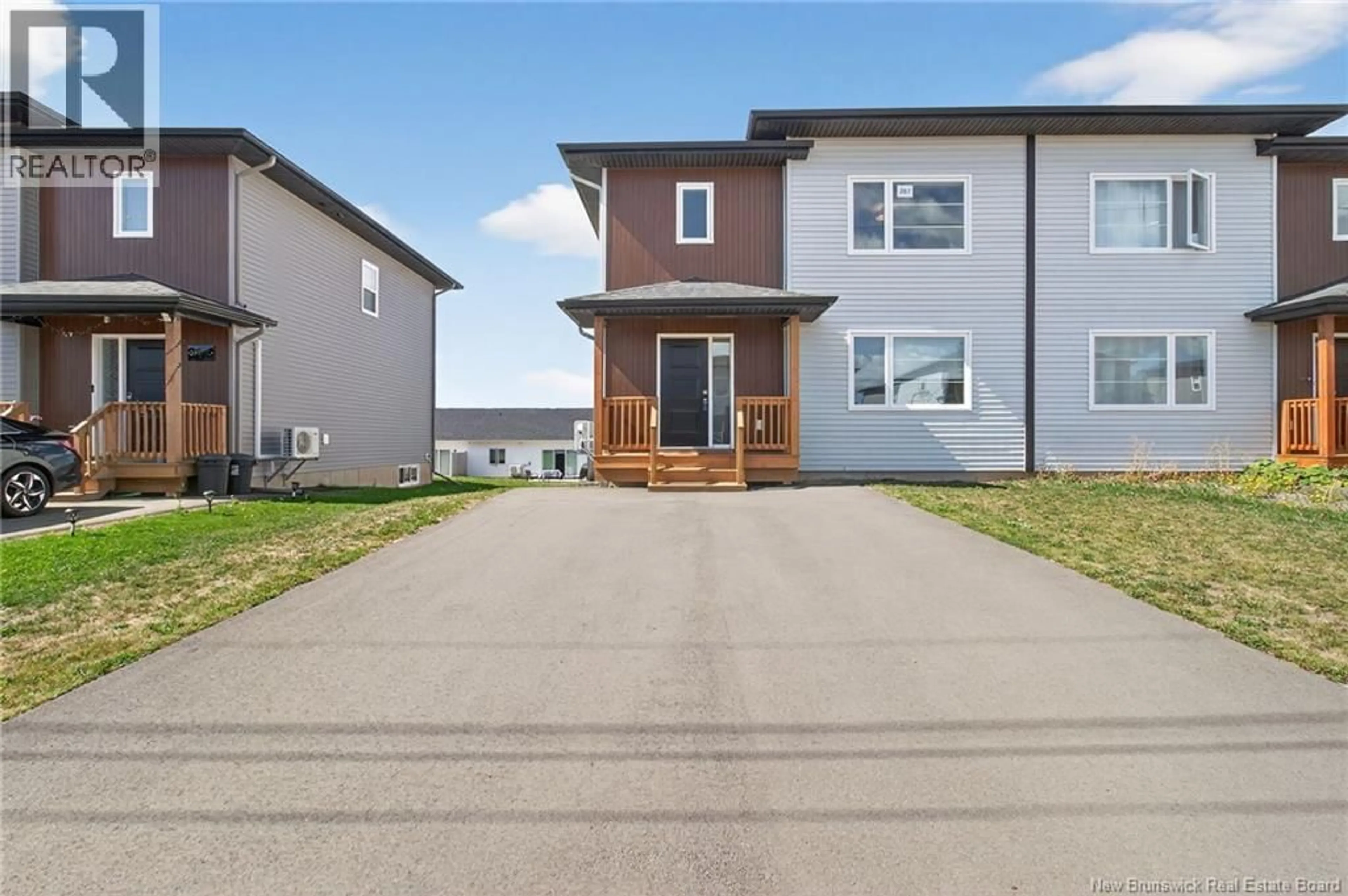 Home with vinyl exterior material, street for 287 LORETTE STREET, Dieppe New Brunswick E1A8M4