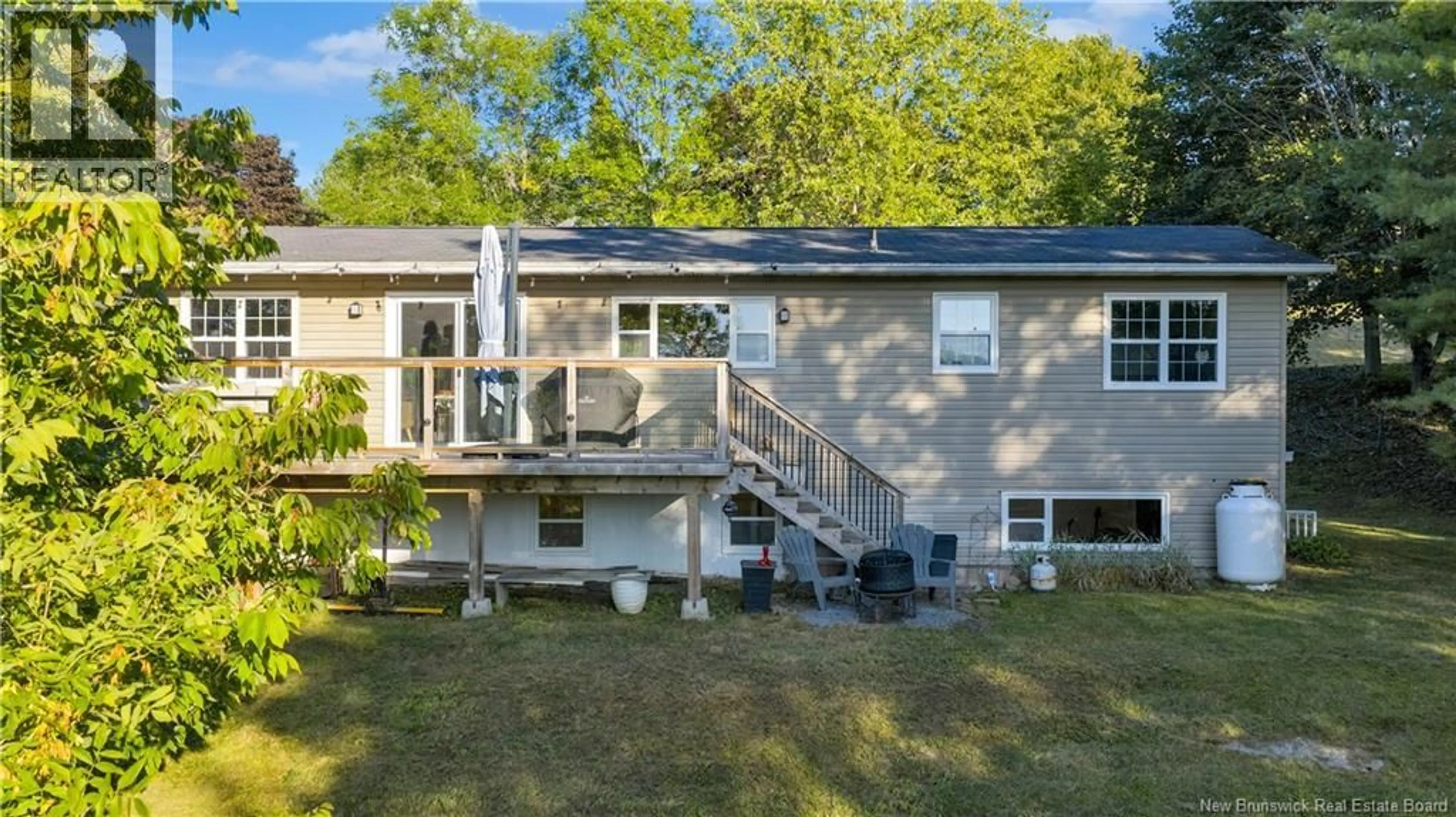 A pic from outside/outdoor area/front of a property/back of a property/a pic from drone, water/lake/river/ocean view for 107 ROBIN HOOD LANE, Quispamsis New Brunswick E2E1E9