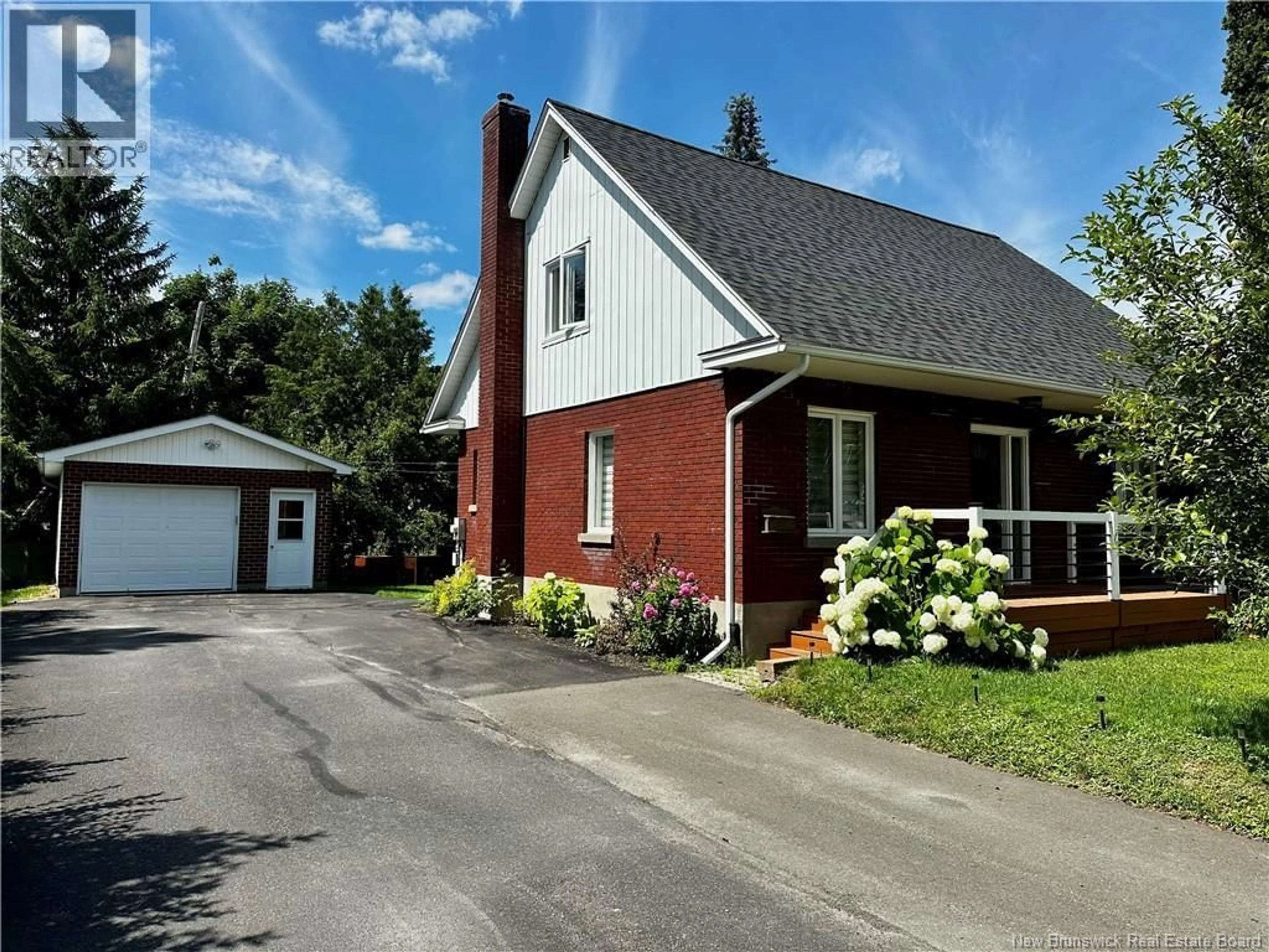 A pic from outside/outdoor area/front of a property/back of a property/a pic from drone, street for 70 ORDONNANCE AVENUE, Edmundston New Brunswick E3V1C5