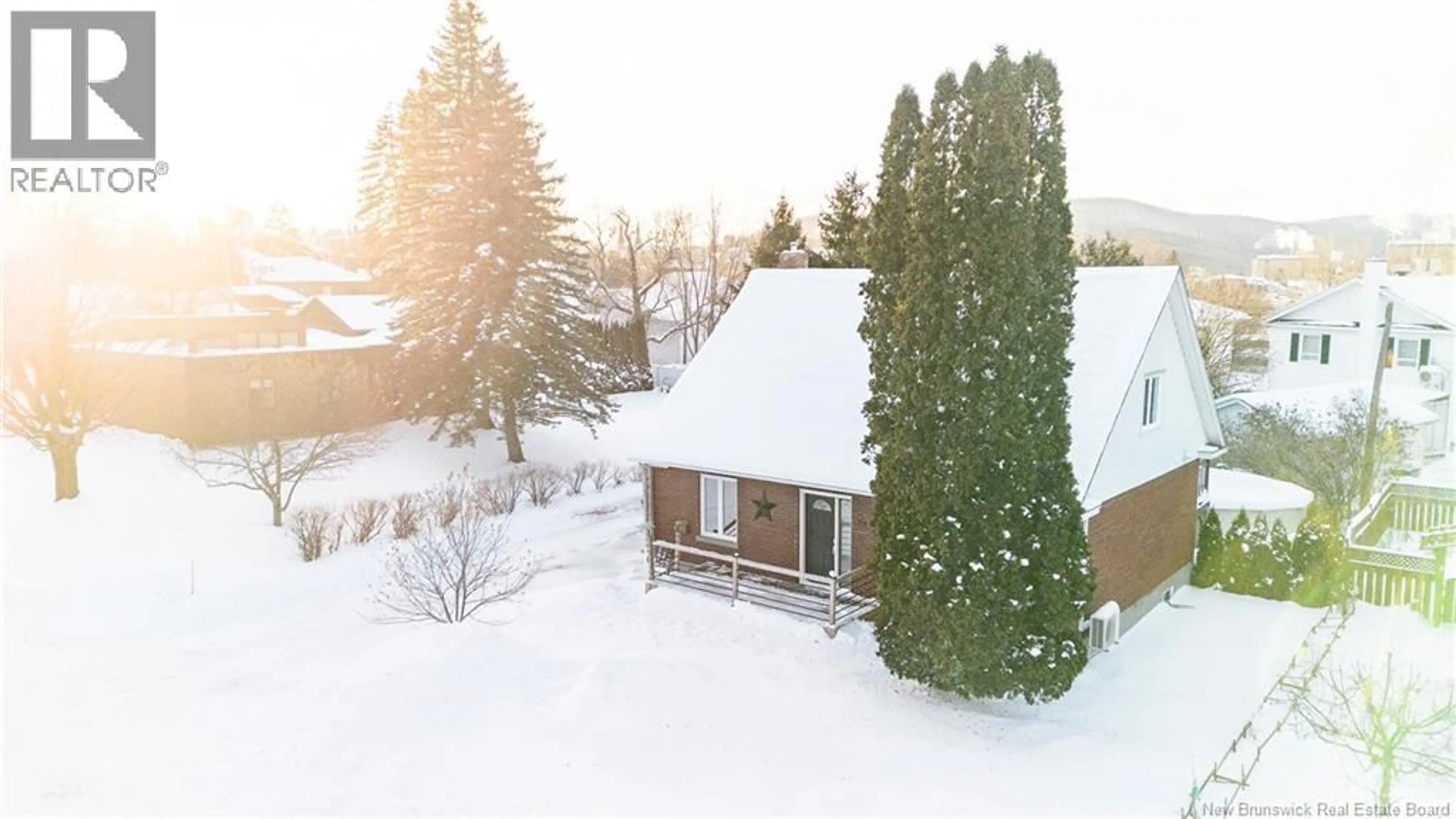 A pic from outside/outdoor area/front of a property/back of a property/a pic from drone, unknown for 70 ORDONNANCE AVENUE, Edmundston New Brunswick E3V1C5