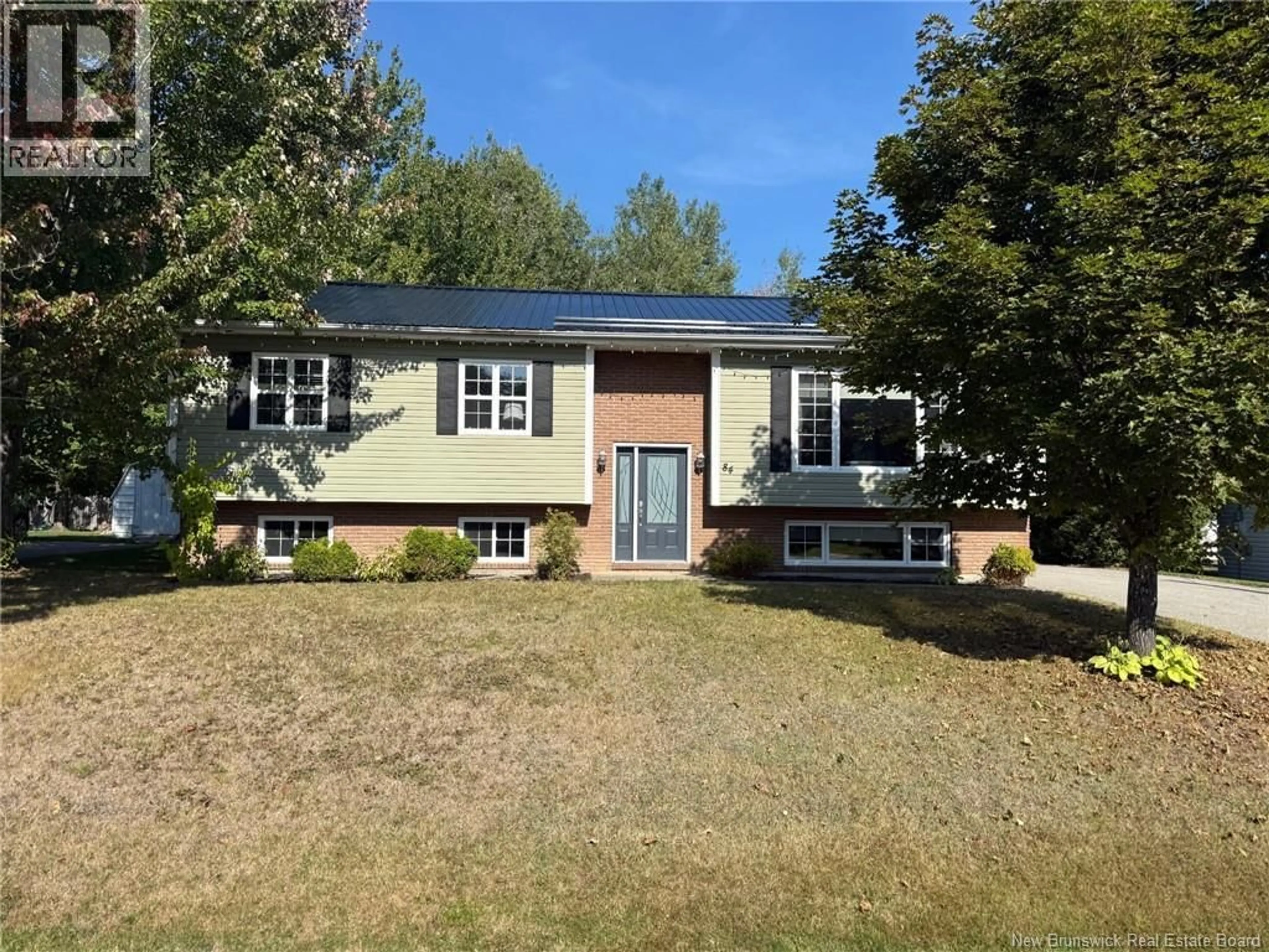 Home with vinyl exterior material, street for 84 CARROLL STREET, Miramichi New Brunswick E1V6R2