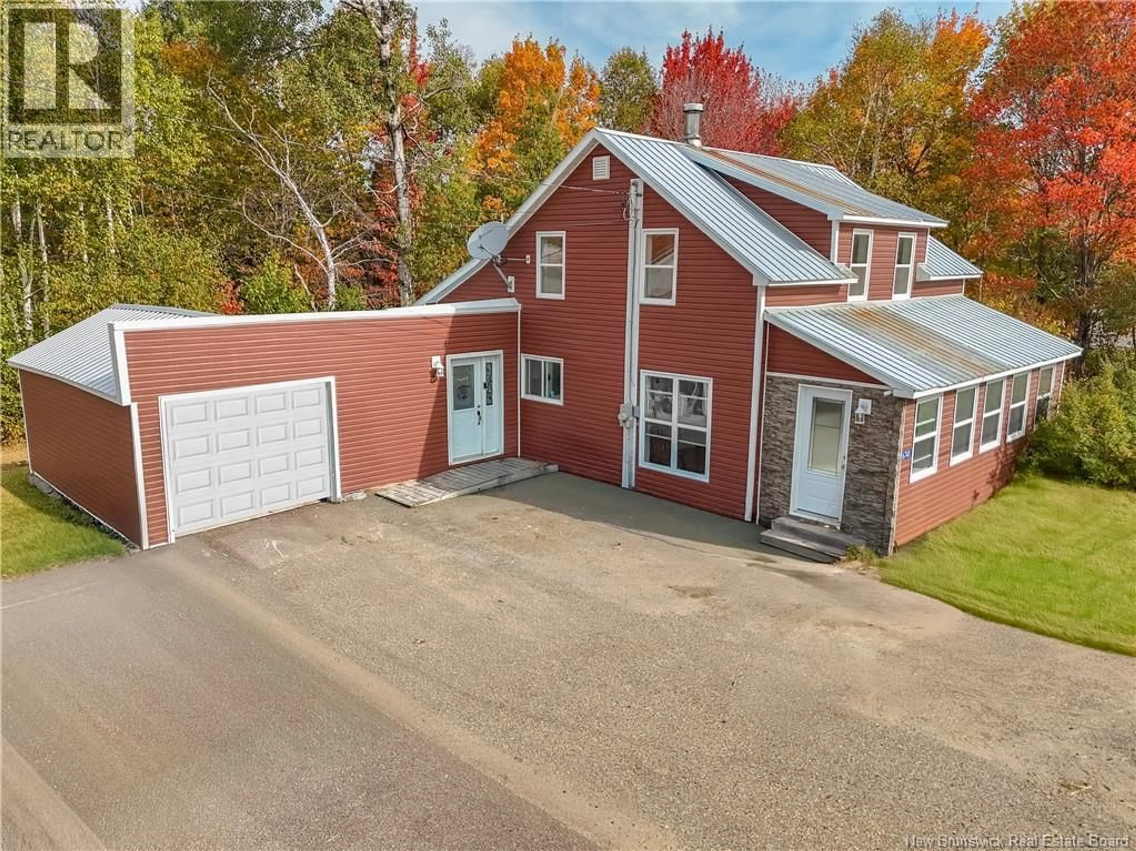 A pic from outside/outdoor area/front of a property/back of a property/a pic from drone, street for 6741 ROUTE 8, Ludlow New Brunswick E9C2H7