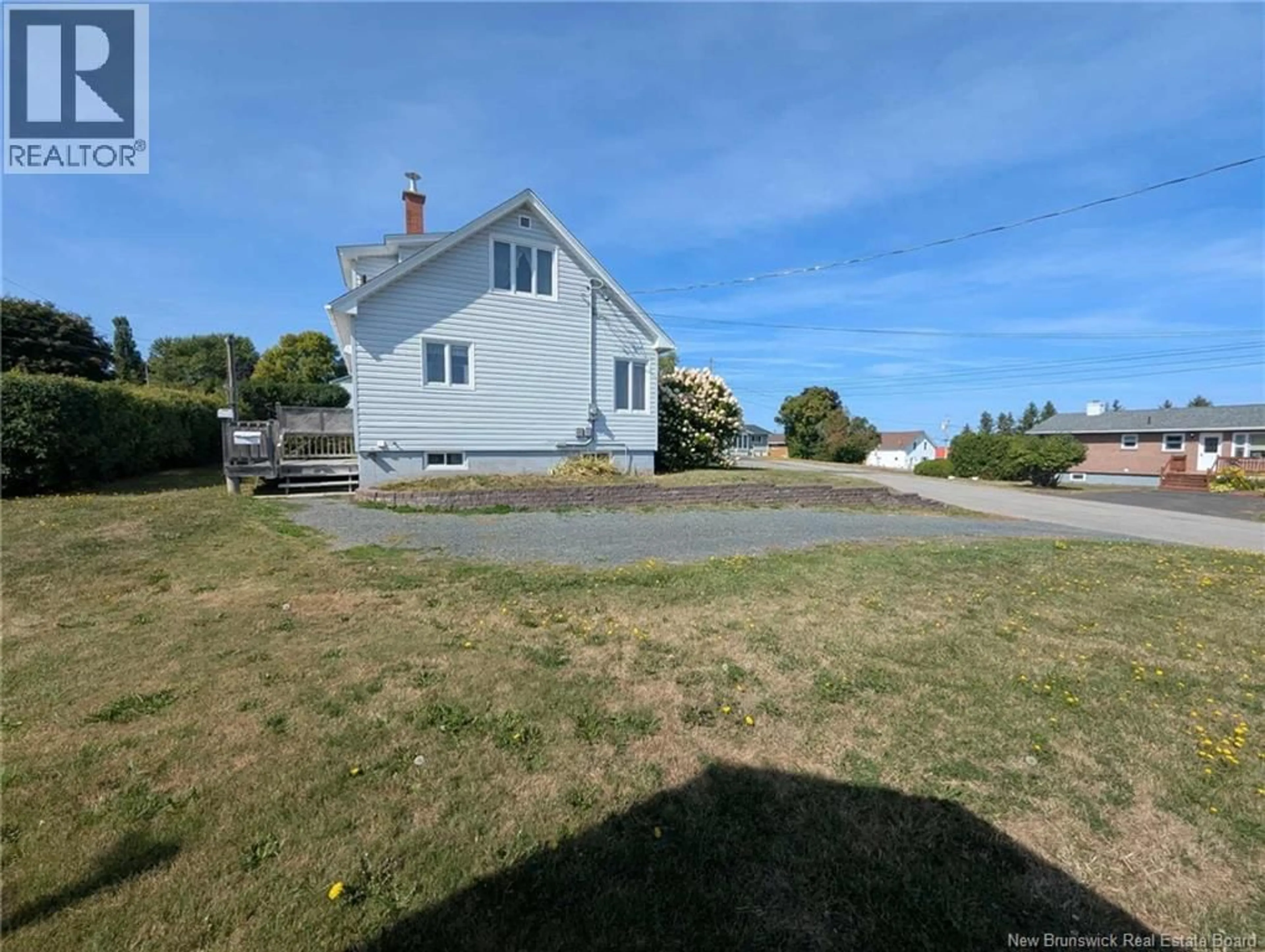 A pic from outside/outdoor area/front of a property/back of a property/a pic from drone, water/lake/river/ocean view for 110 MELANSON, Bathurst New Brunswick E2A1L4