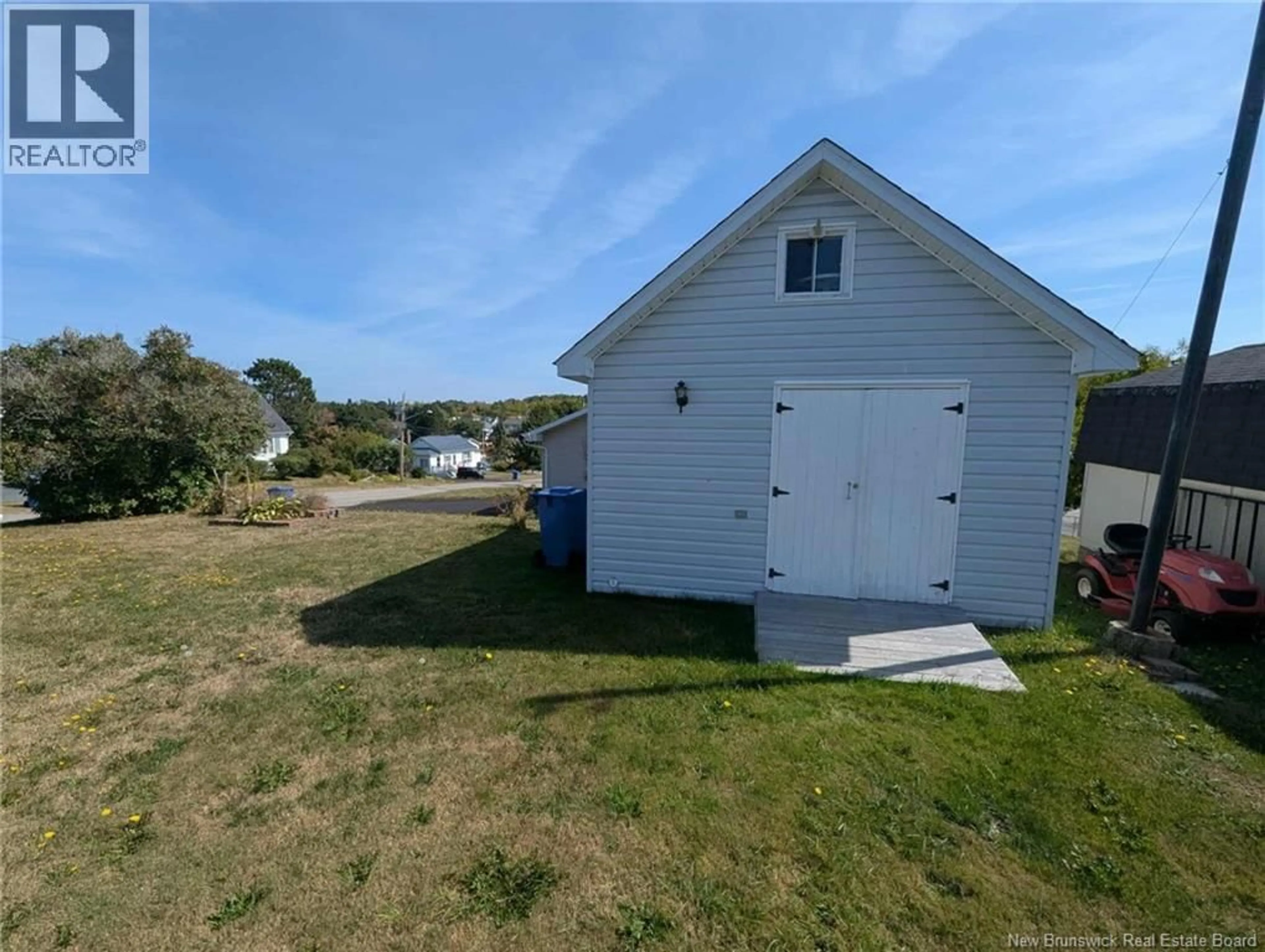 A pic from outside/outdoor area/front of a property/back of a property/a pic from drone, water/lake/river/ocean view for 110 MELANSON, Bathurst New Brunswick E2A1L4