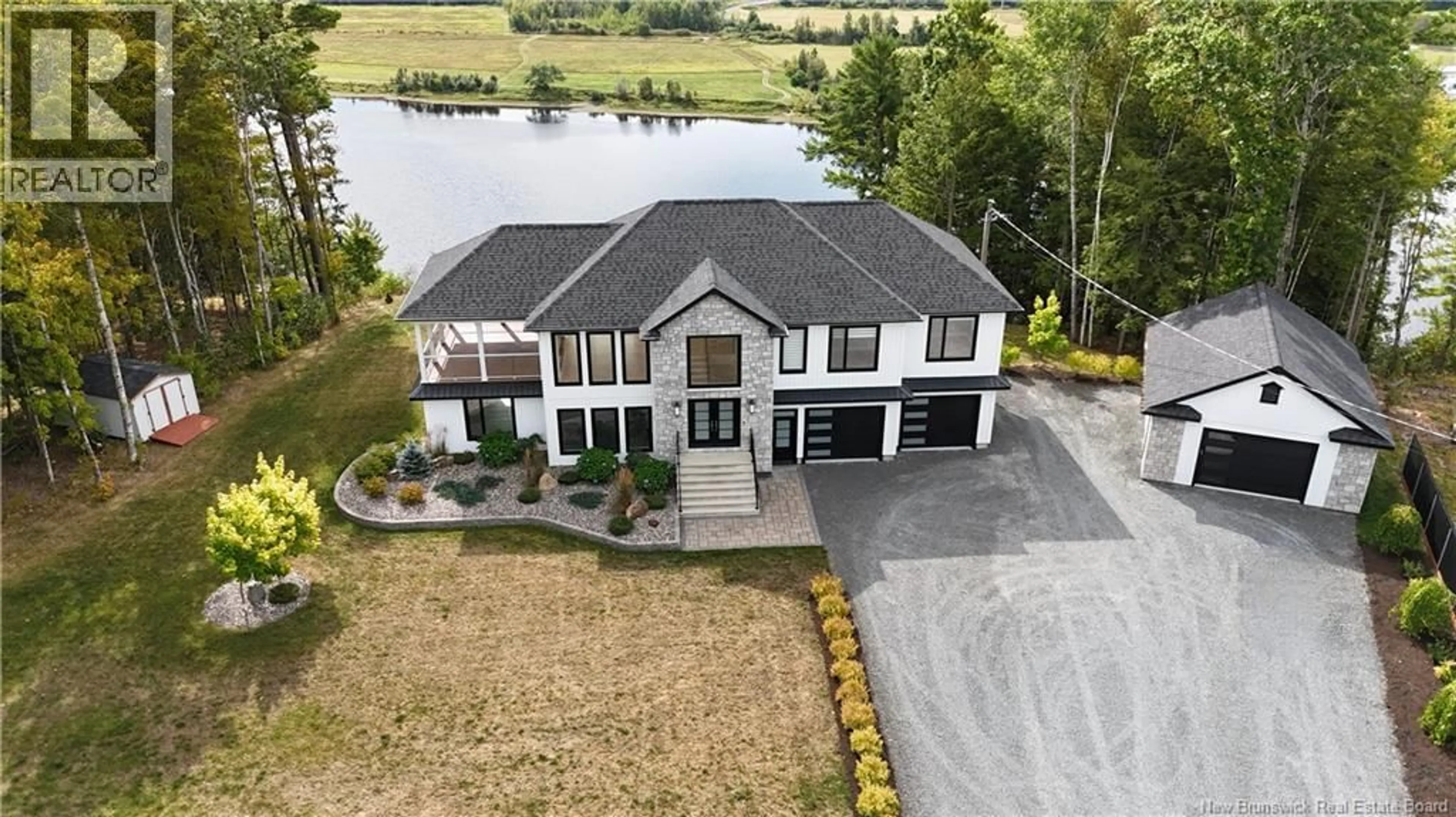 A pic from outside/outdoor area/front of a property/back of a property/a pic from drone, water/lake/river/ocean view for 230 CROCKS POINT ROAD, Keswick Ridge New Brunswick E6L1T7