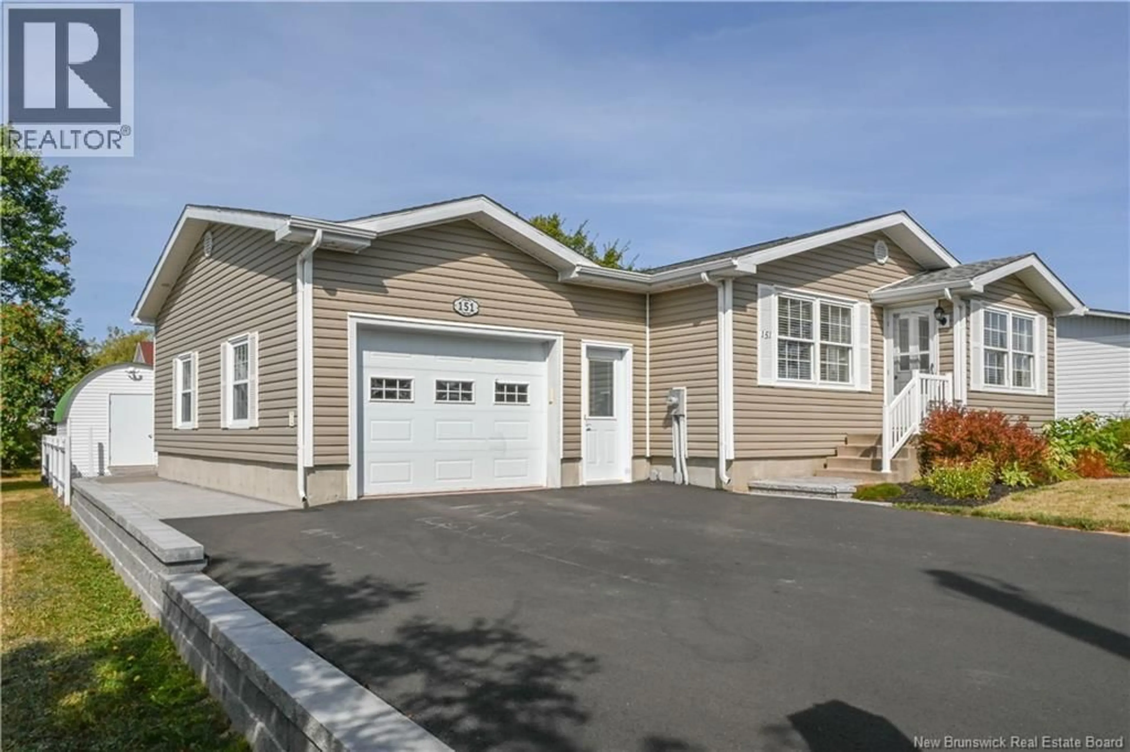 Home with vinyl exterior material, street for 151 RUE DES PEUPLIERS, Shippagan New Brunswick E8S1J7
