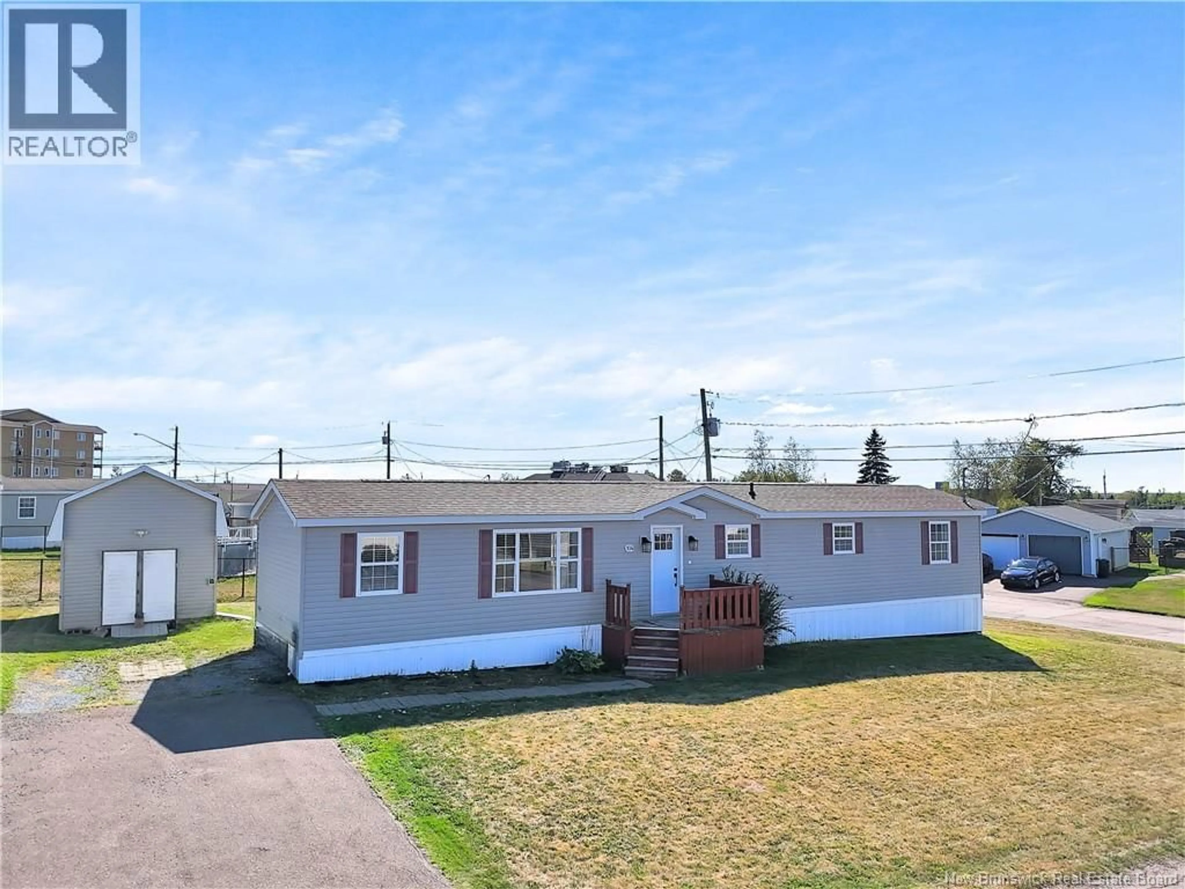 A pic from outside/outdoor area/front of a property/back of a property/a pic from drone, street for 104 CANAAN STREET, Dieppe New Brunswick E1A7N1