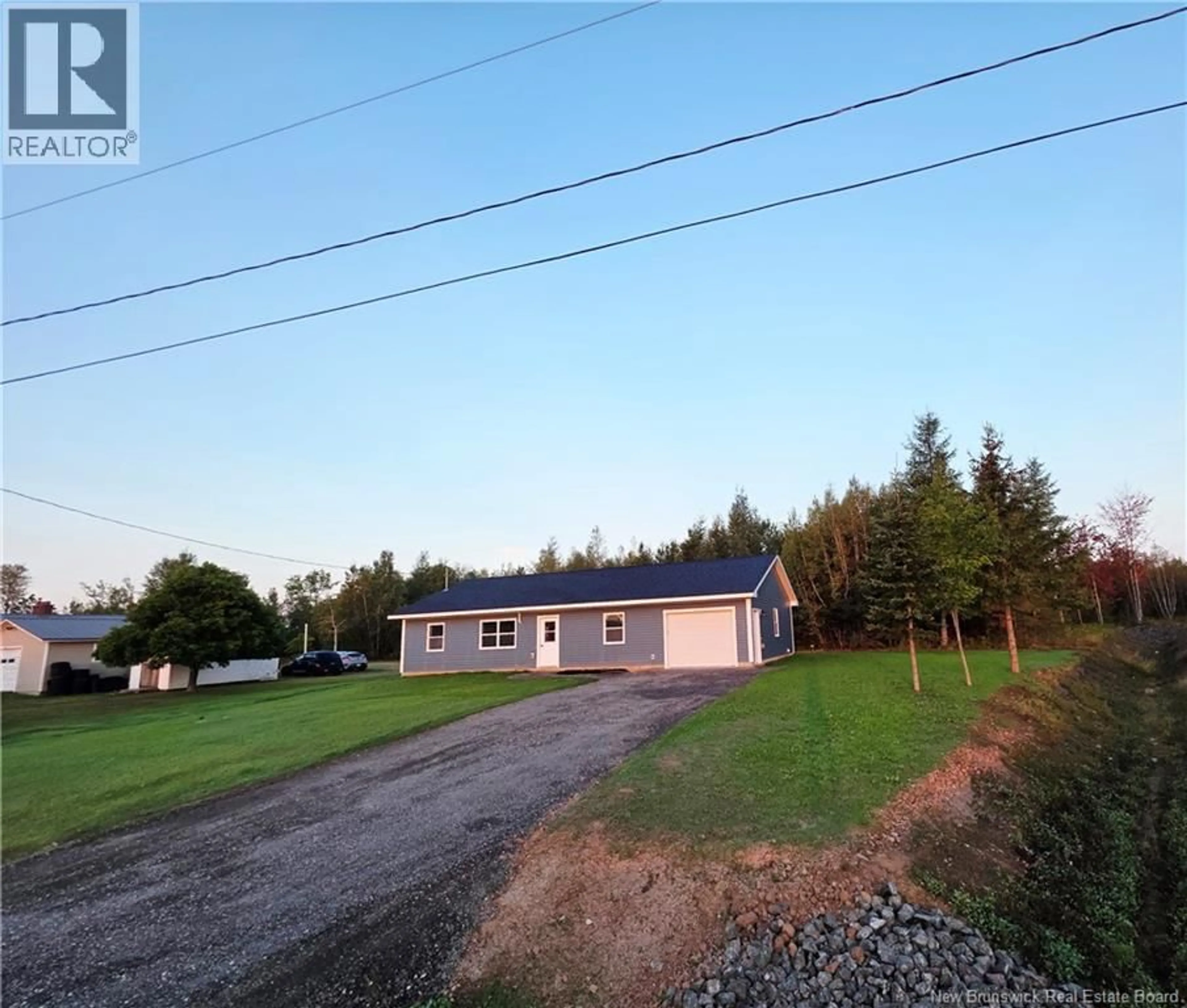A pic from outside/outdoor area/front of a property/back of a property/a pic from drone, unknown for 8 FAWCETT AVENUE, Petitcodiac New Brunswick E4Z4H4