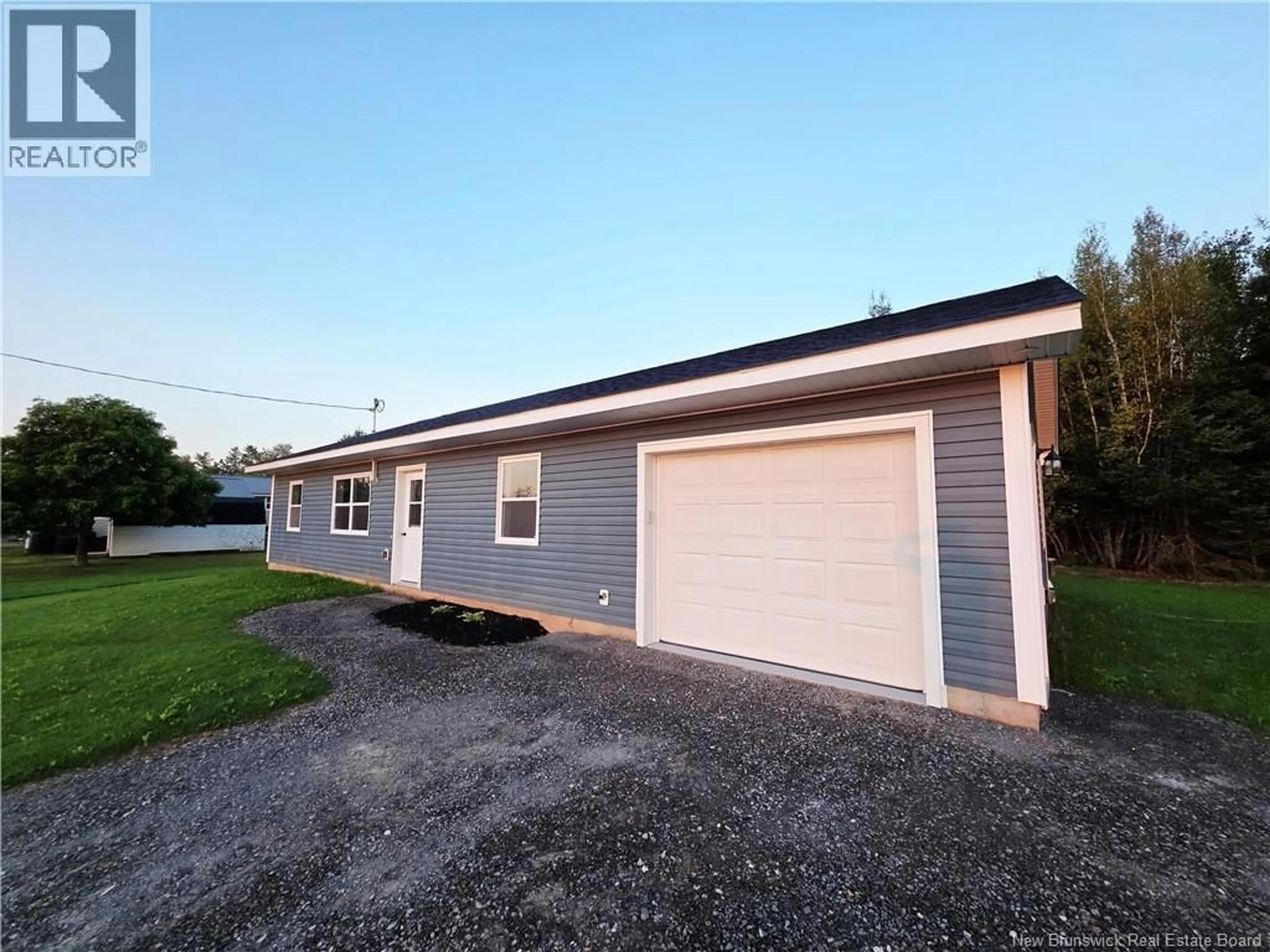 Home with vinyl exterior material, street for 8 FAWCETT AVENUE, Petitcodiac New Brunswick E4Z4H4