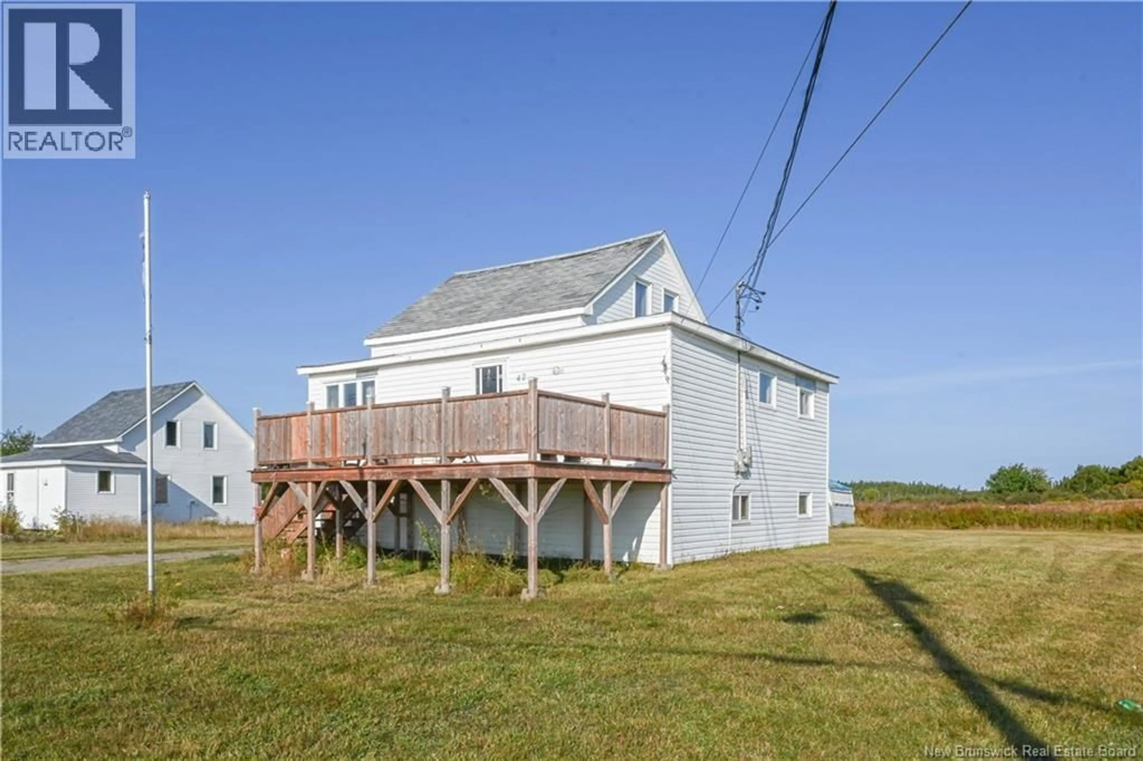 A pic from outside/outdoor area/front of a property/back of a property/a pic from drone, water/lake/river/ocean view for 42 FERRON STREET, Cap-Bateau New Brunswick E8T3E4