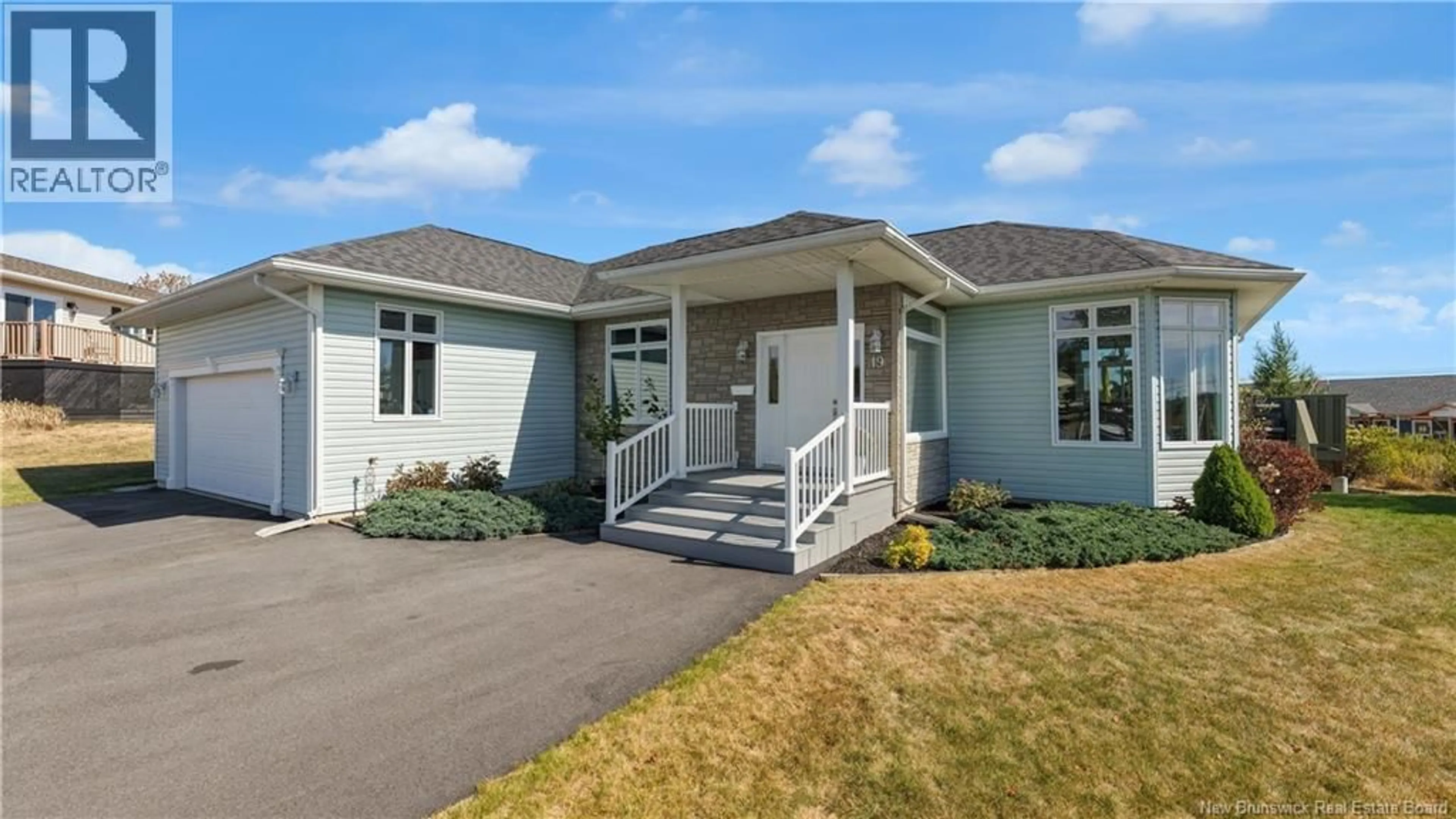 Home with vinyl exterior material, street for 19 LAKEFIELD COURT, Saint John New Brunswick E2J5B3
