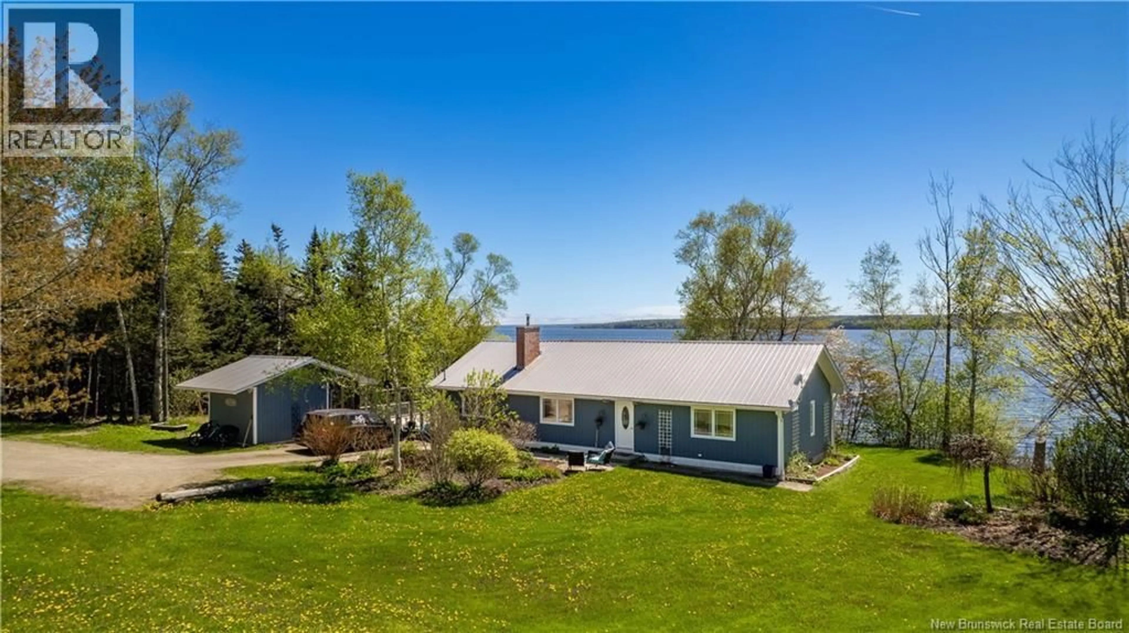 A pic from outside/outdoor area/front of a property/back of a property/a pic from drone, water/lake/river/ocean view for 3584 127 ROUTE, Bayside New Brunswick E5B2V3