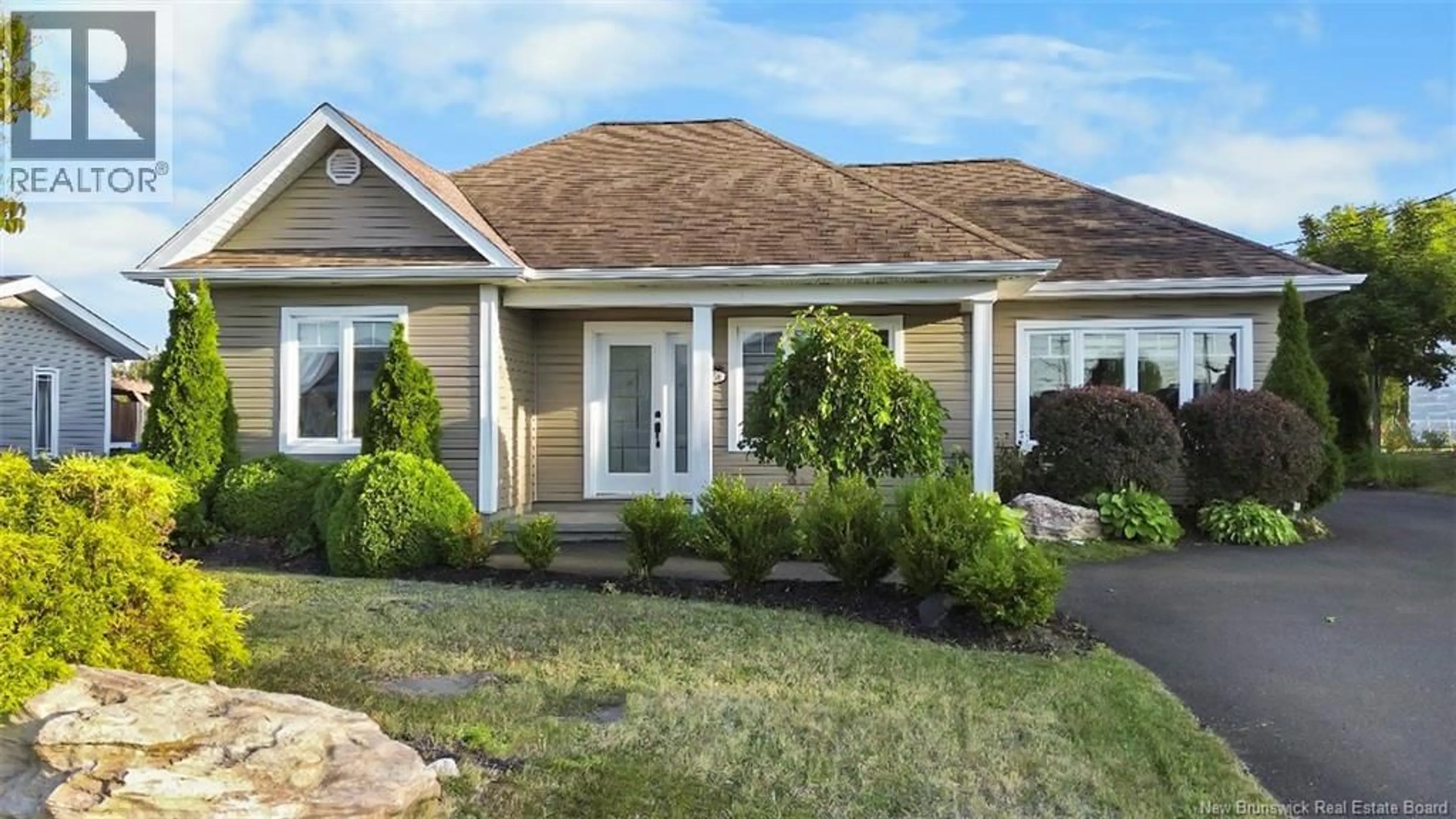 Home with vinyl exterior material, street for 456 MSGR RICHARD, Beresford New Brunswick E8K1Y8