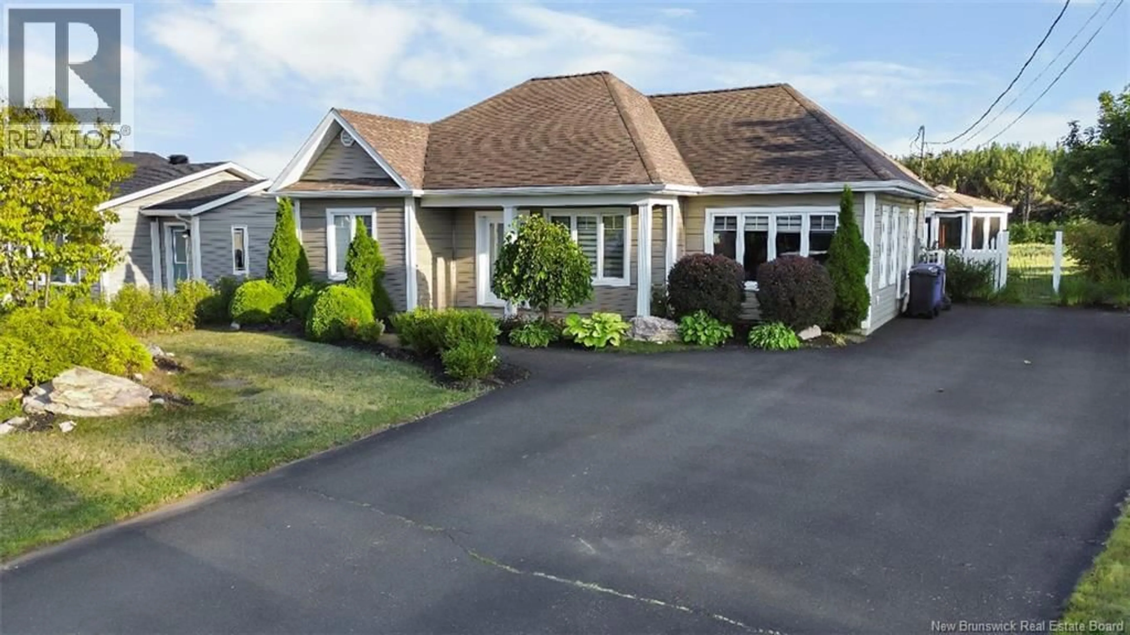 Home with vinyl exterior material, street for 456 MSGR RICHARD, Beresford New Brunswick E8K1Y8
