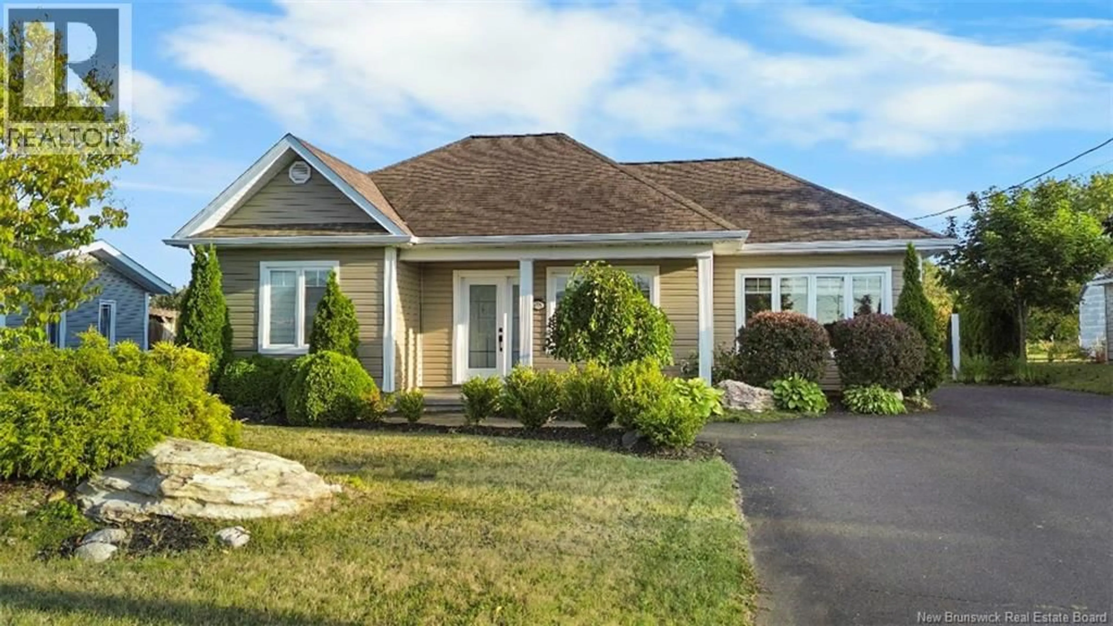 Home with vinyl exterior material, street for 456 MSGR RICHARD, Beresford New Brunswick E8K1Y8