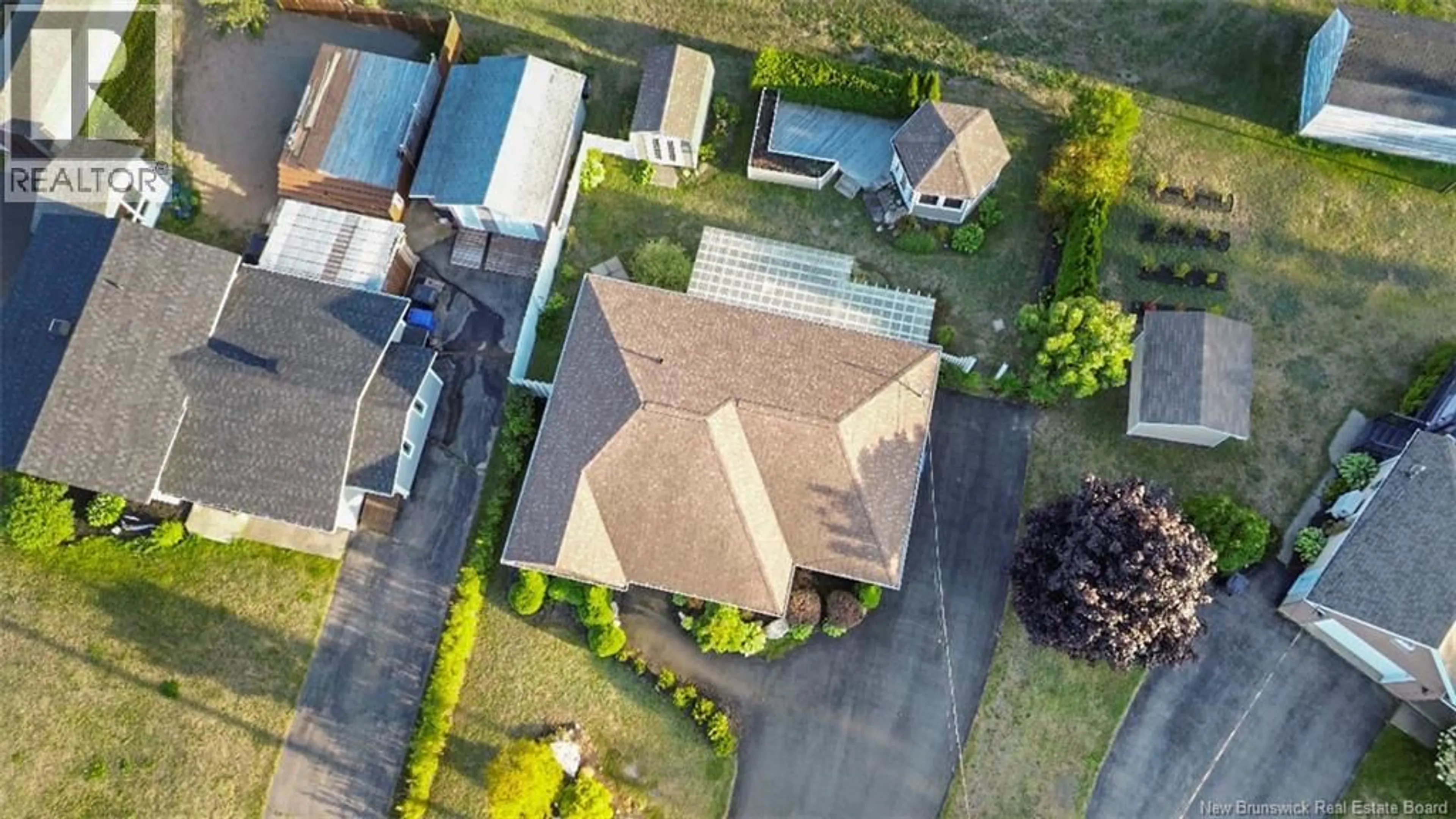 A pic from outside/outdoor area/front of a property/back of a property/a pic from drone, street for 456 MSGR RICHARD, Beresford New Brunswick E8K1Y8