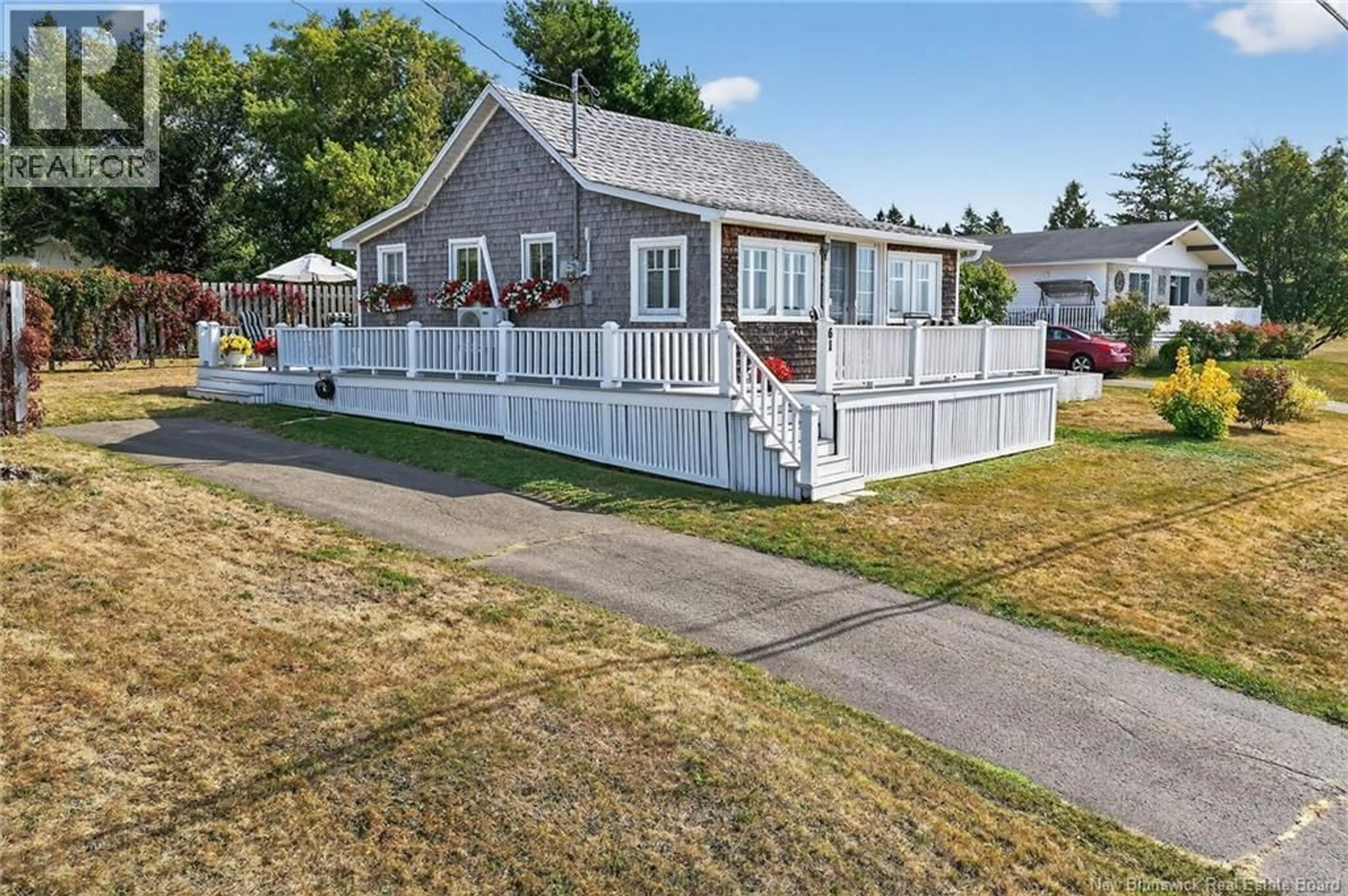 A pic from outside/outdoor area/front of a property/back of a property/a pic from drone, street for 61 COCAGNE SUD ROAD, Cocagne New Brunswick E4R2J7